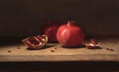 Pomegranates on a Table