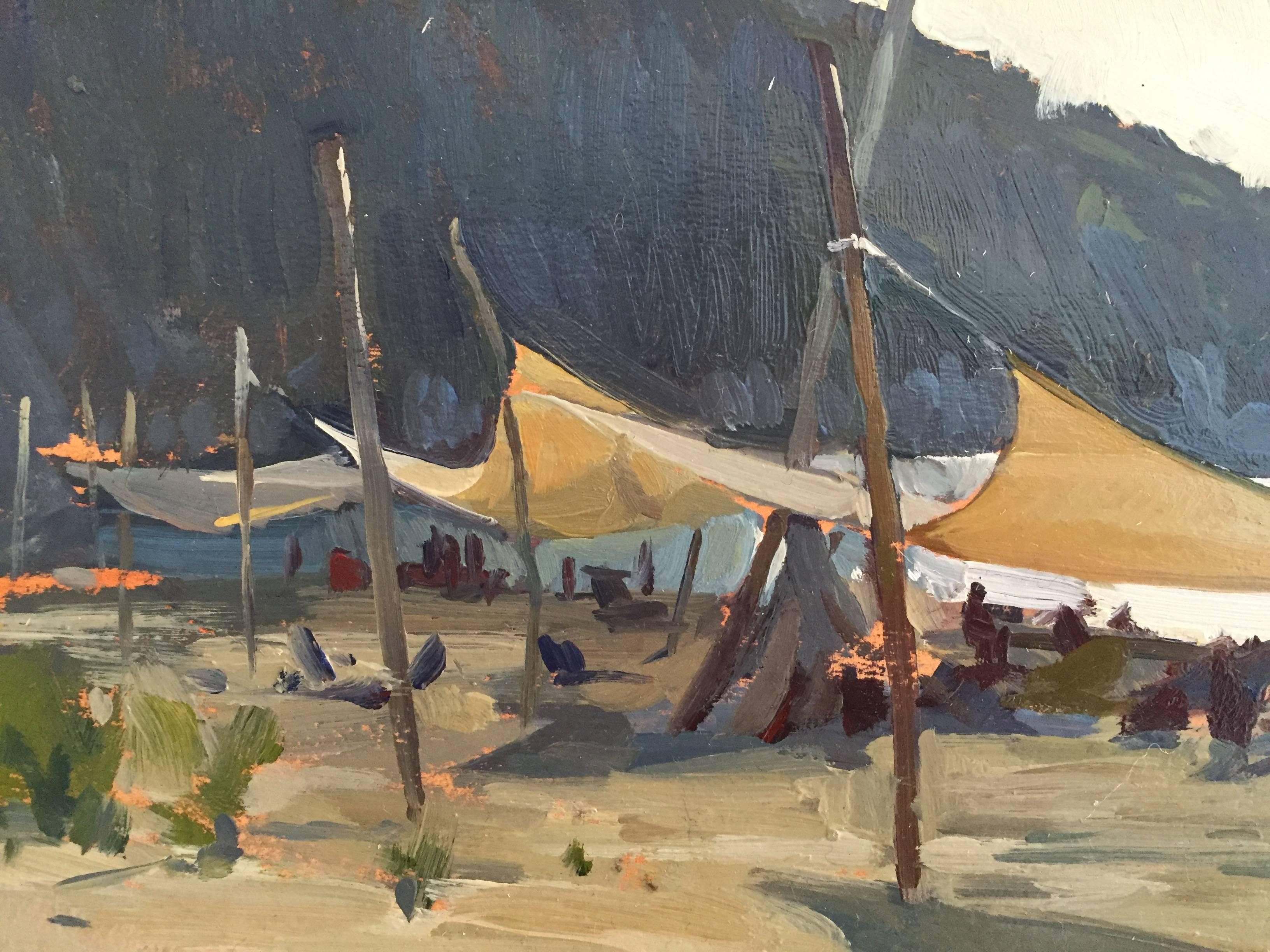 Painted en plein air on a beach in Italy. Sheets are strung up and stretched with driftwood, and create a shaded area for beach-goers to sit beneath. The rigid driftwood poles arranged on tilted angles make for a interesting composition. The sky is