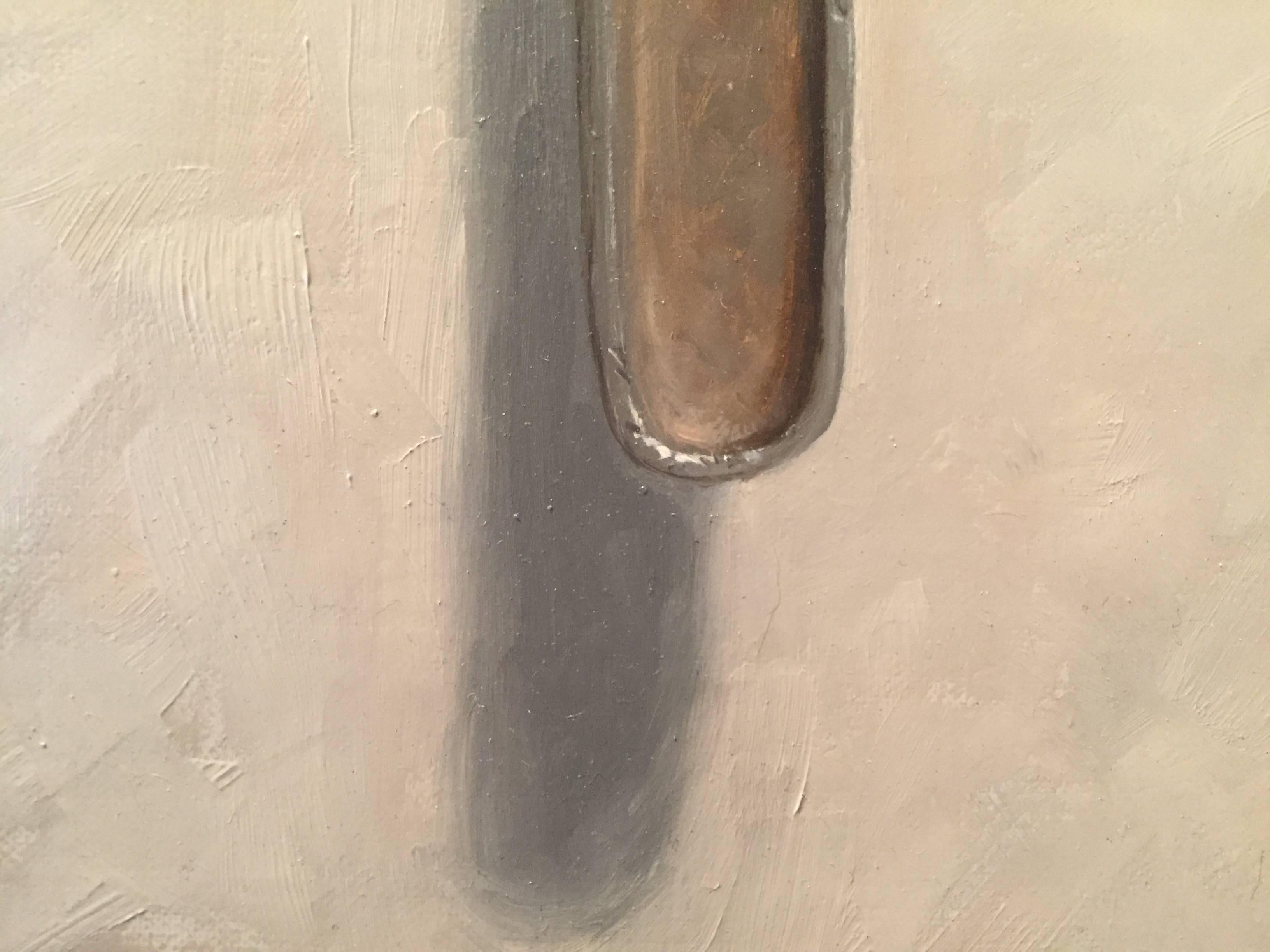 Painted from life, a workers tool. Hanging from a tiny metal nail, this heavy wrench looks as though one could reach out and grab it! Trompe L'Oeil is the expression; the literal definition is to 