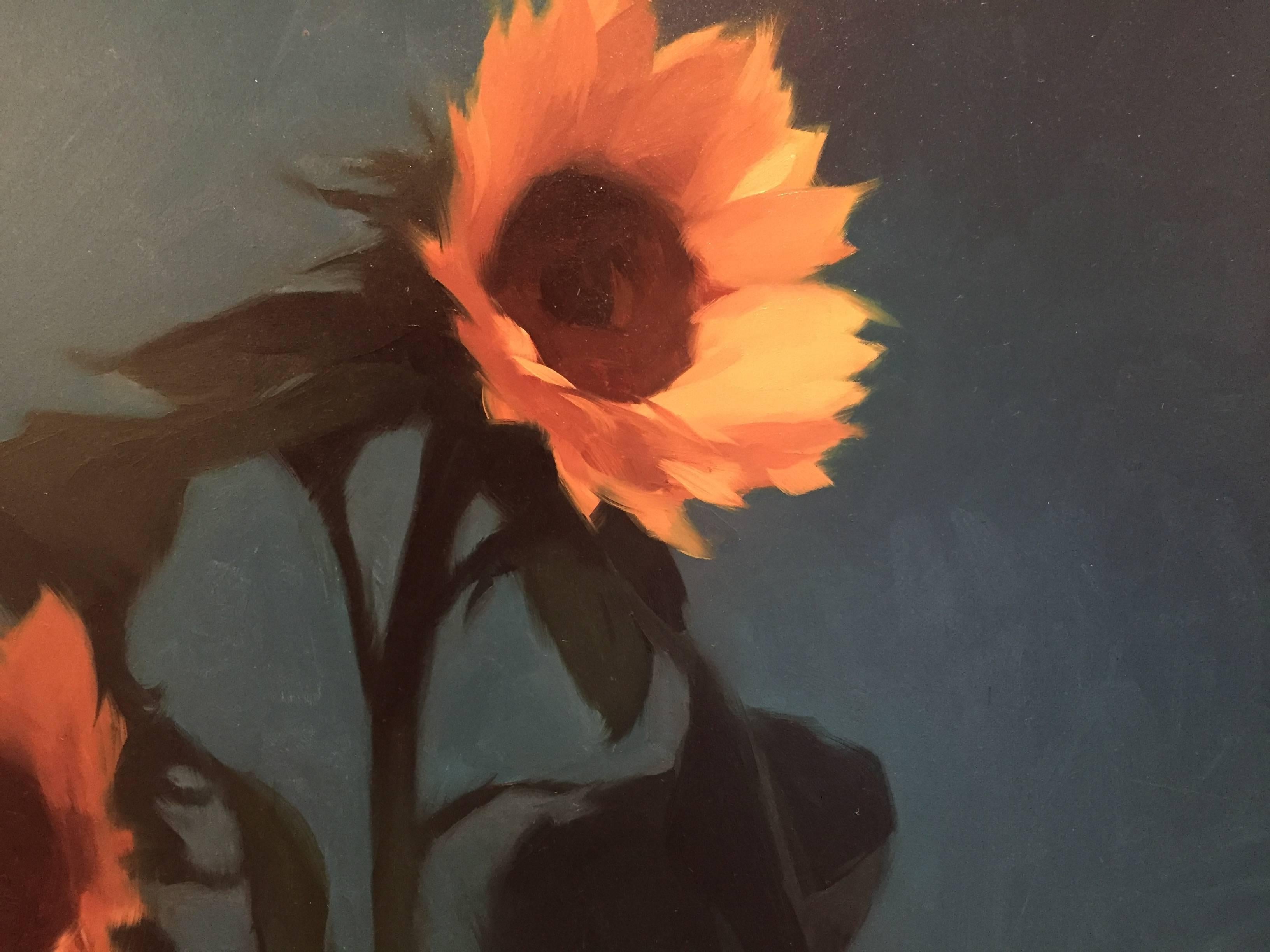 A still life painting of sunflowers, composed against a blue background, petals catch light from a source above.

Framed dimensions: 14 x 14 inches

Born in Memphis, Tennessee in 1980 Bauman's family soon after that relocated to Miami, Florida where