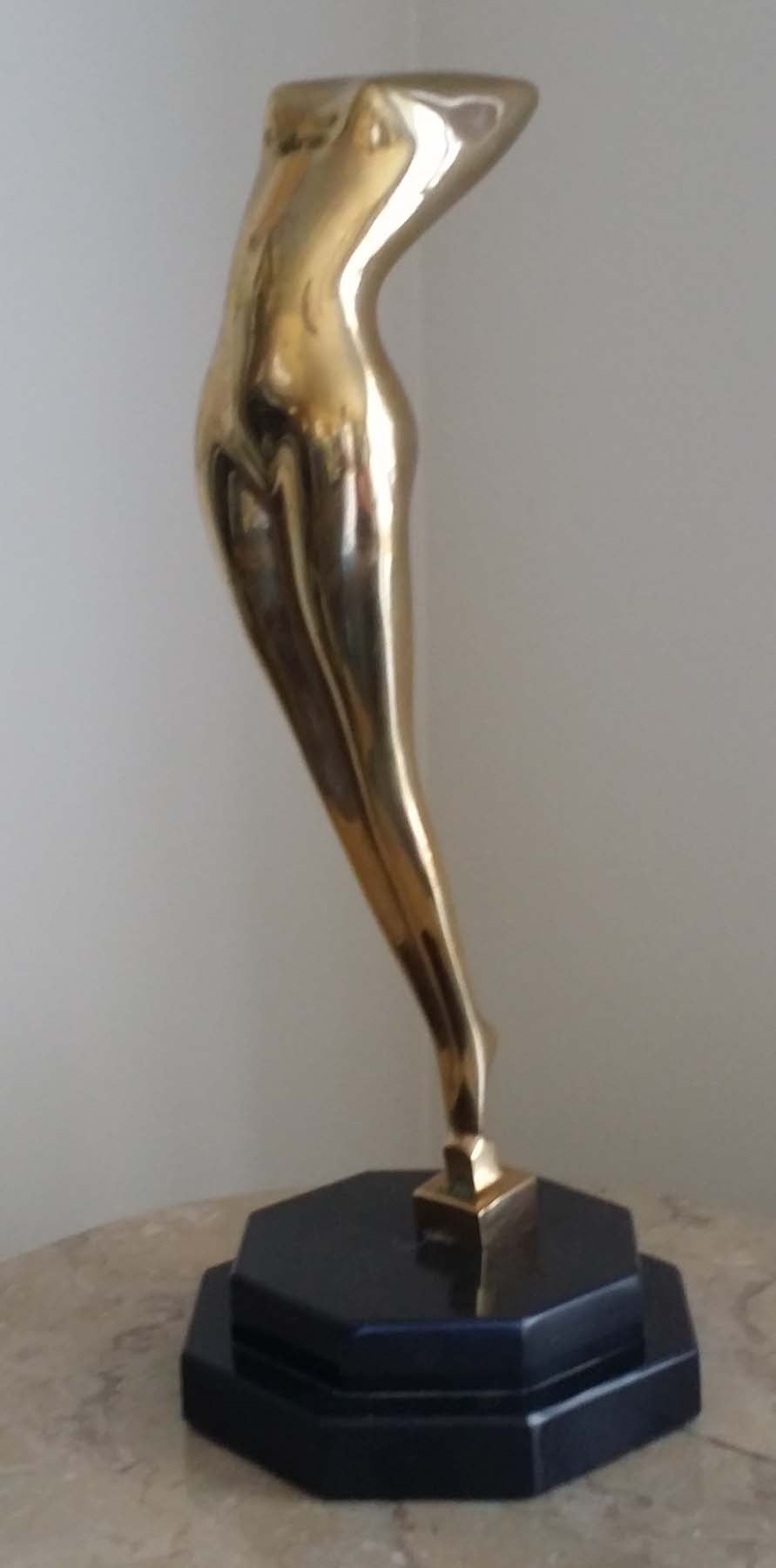 James B. Gibson

Polished bronze female figure, signed and dated 1983

On marble base, 12 inches tall.