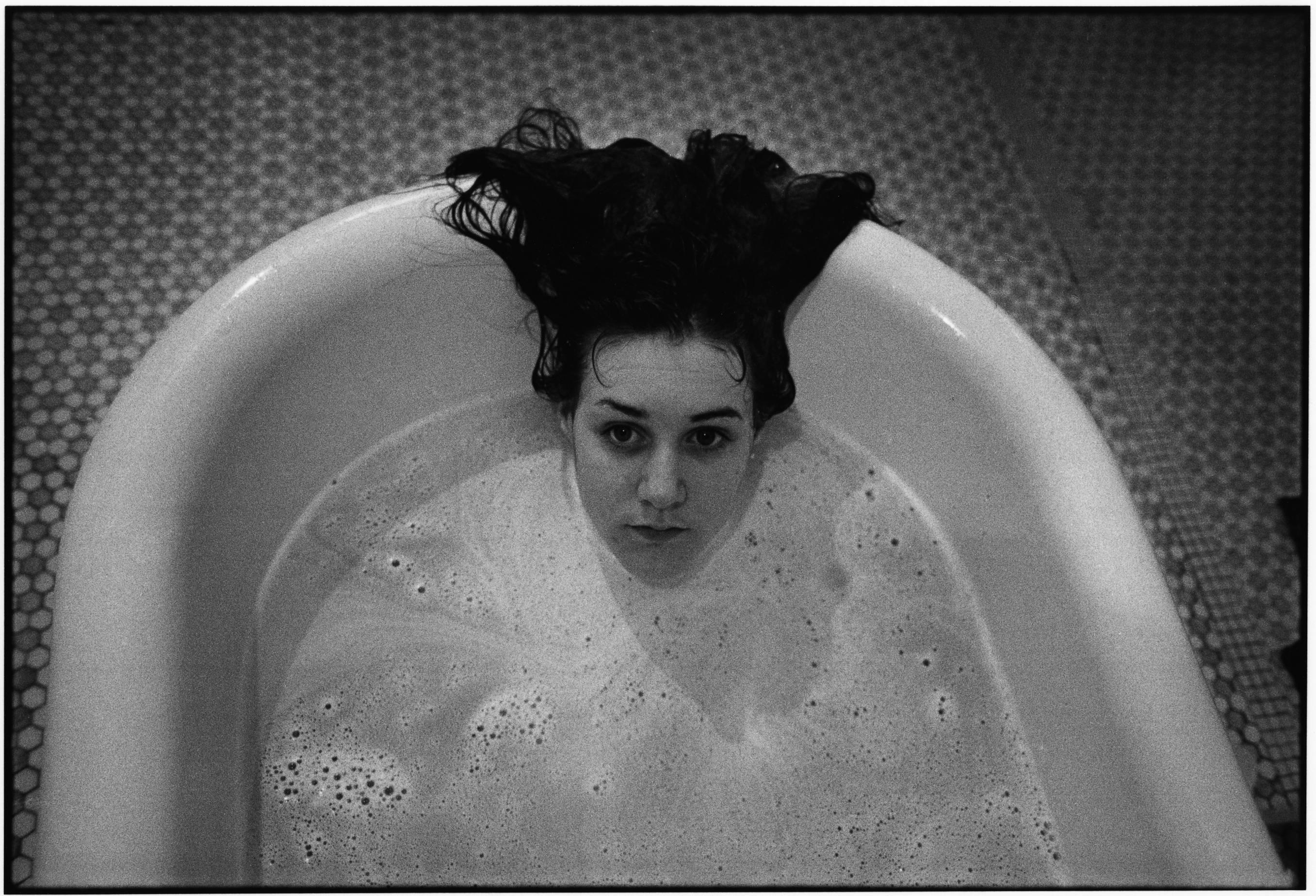 Mary Ellen Mark Black and White Photograph - Laurie in the bathtub