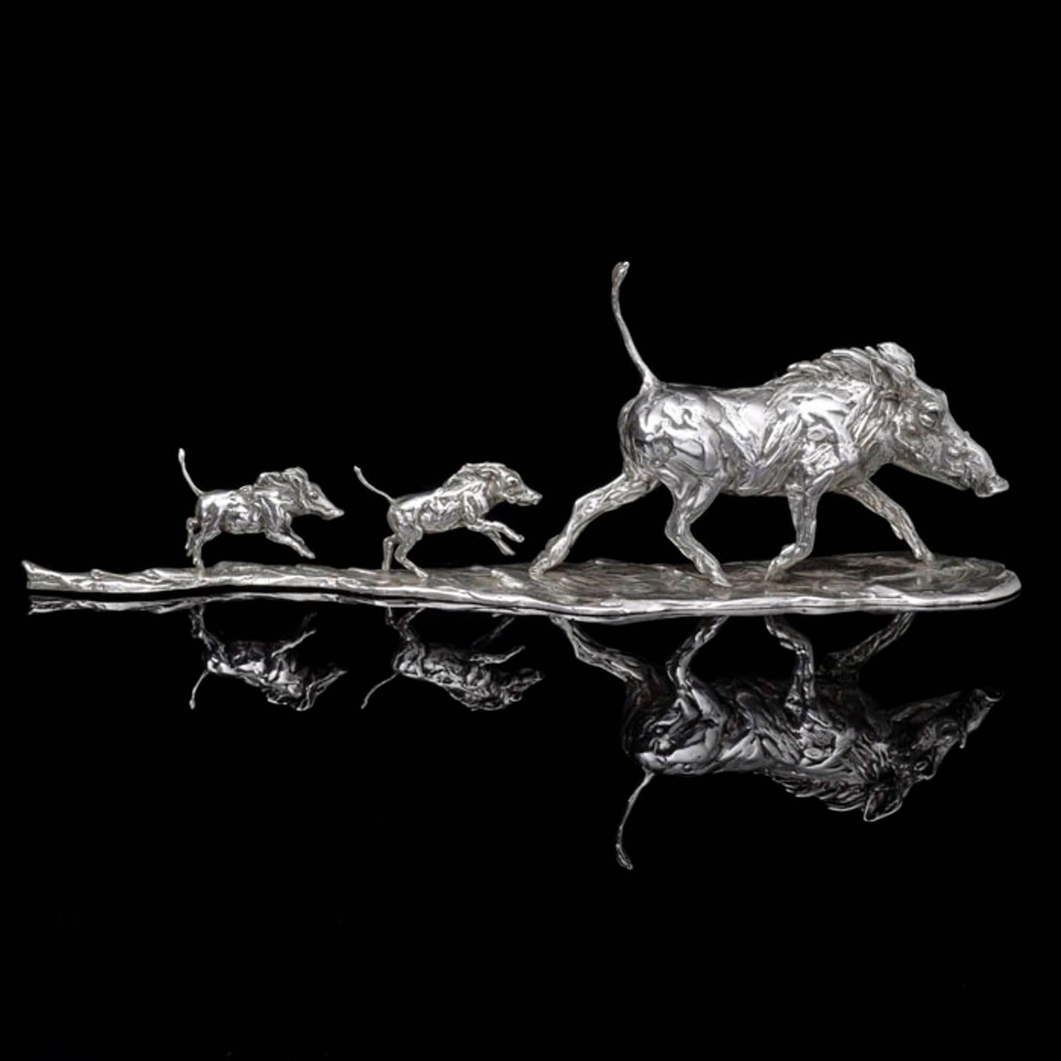 The limited edition finely modelled warthog trio with a mother trotting along in front of her two offspring who scamper excitedly after her, their upright tails waving behind them. This delightful family scene has been sculpted in Kinsella’s