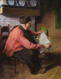 Man in Volendam costume reading a paper
