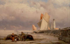 Beach view with people and sailing boats