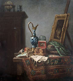 Still Life with various objects and a Delft blue jug and an easel