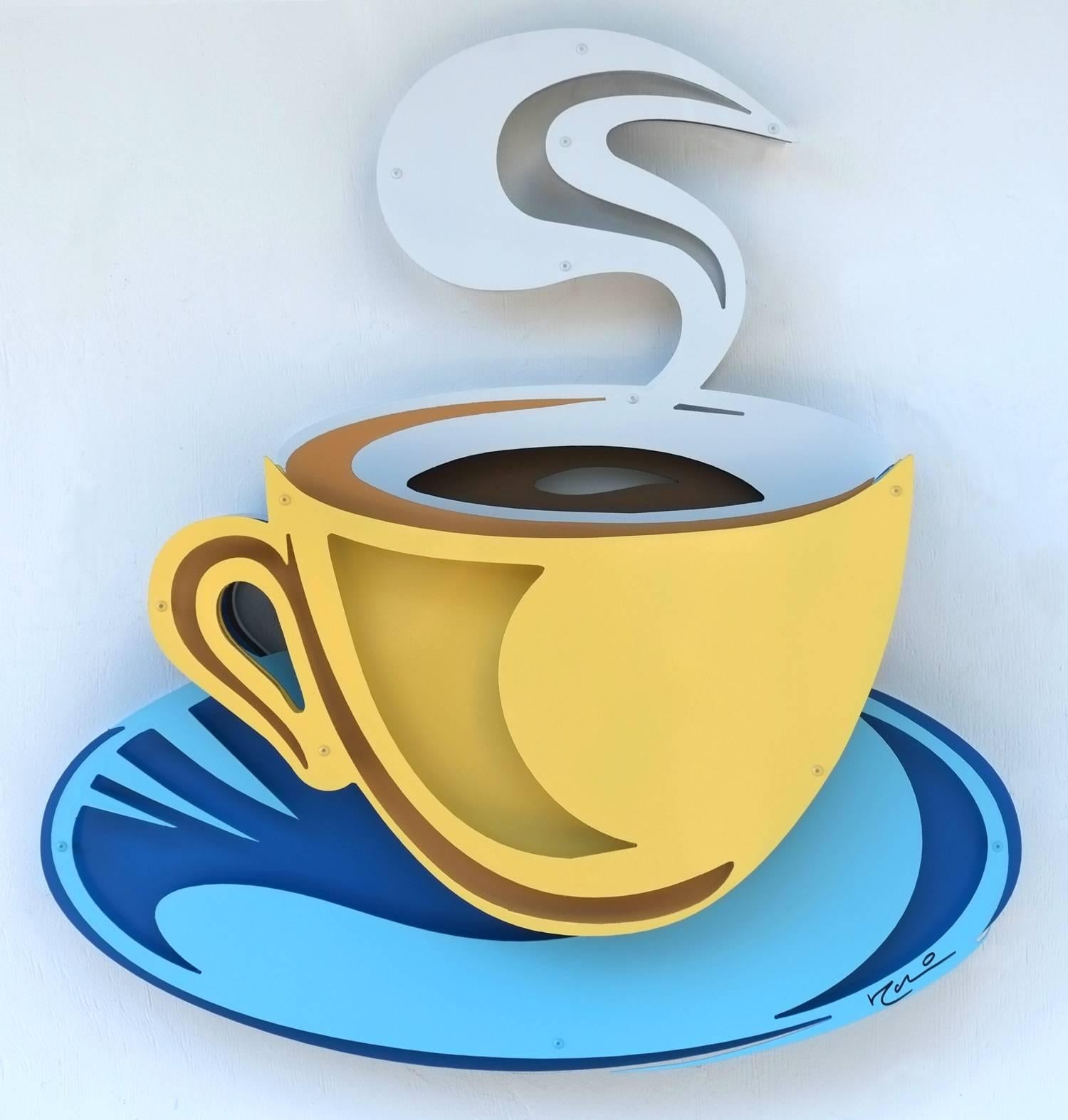 La tasse à café jaune sur bleu