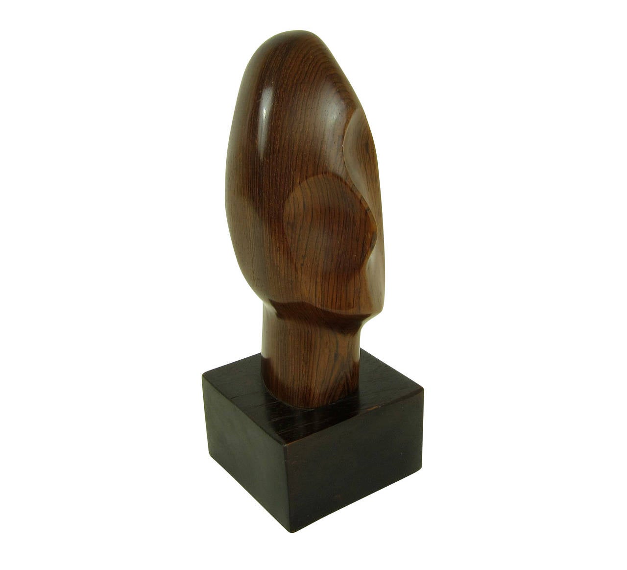Beautifully stylized modernist visage by famous French artist Alexandre Noll.
This is a rare work and it is in excellent condition.
Stands 10 1/4" tall, and measures 3 3/4" x 3 3/4" width at the base.
Signed on the back.
Circa 1950's.