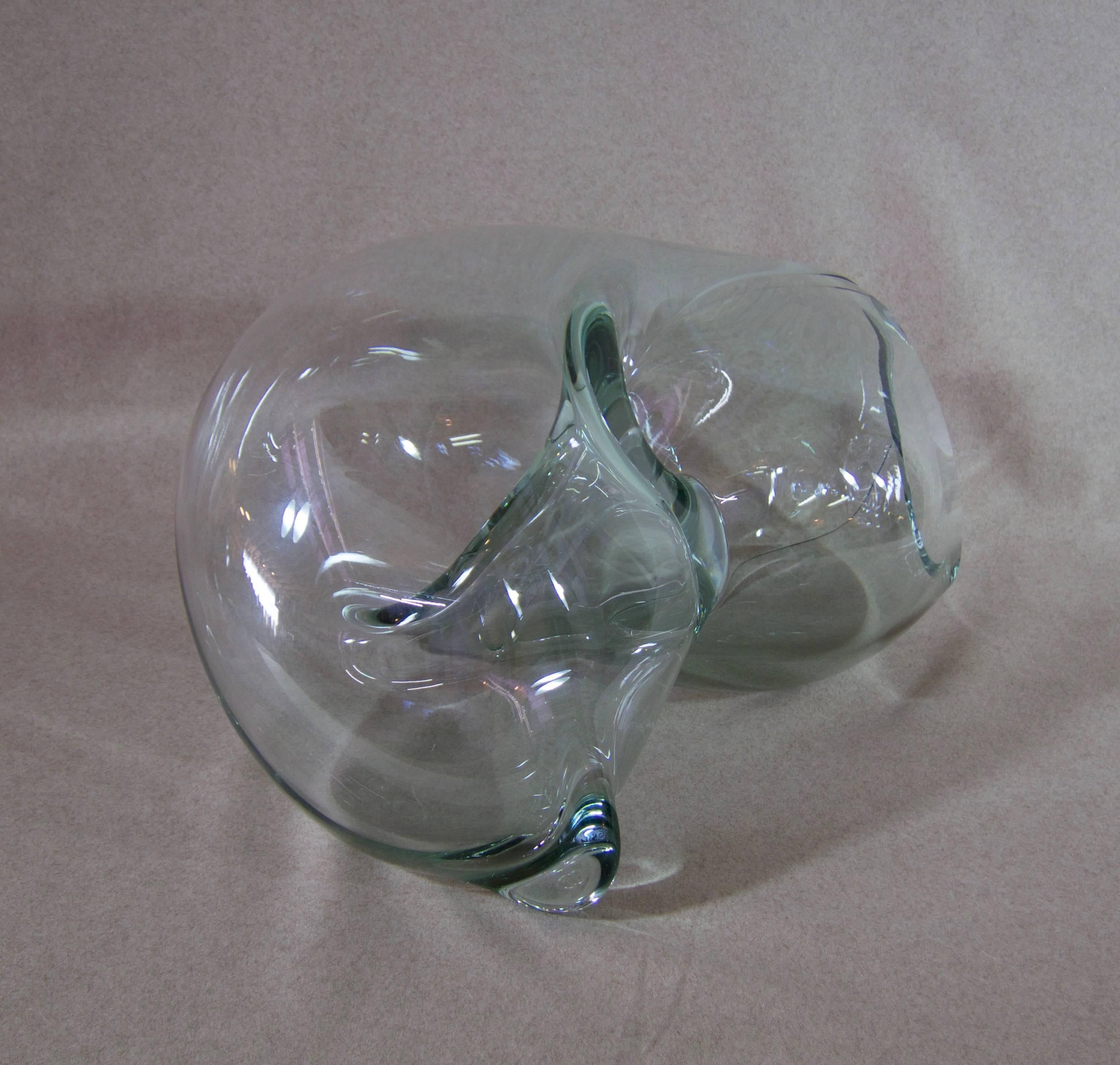 Biomorphic blown and stretched glass sculpture/vessel by American artist John Bingham.
John Bingham, (Santa Fe, NM), is an American studio glass artist.  This work is very typical of the artist's work, and can be displayed as a sculpture, or used a