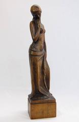 Untitled art deco sculpture, partially disrobed woman in thought