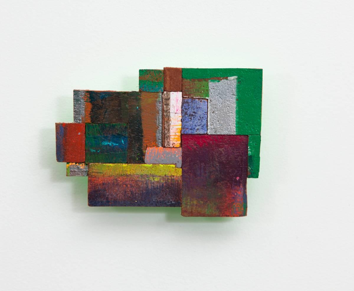 Joan Grubin sources paint-covered, protective pressed wood from a supply that amassed in her studio over a 13-year period. She cuts and orchestrates these vibrant fragments, covered in accumulated layers of detrital brushstrokes, into collages that