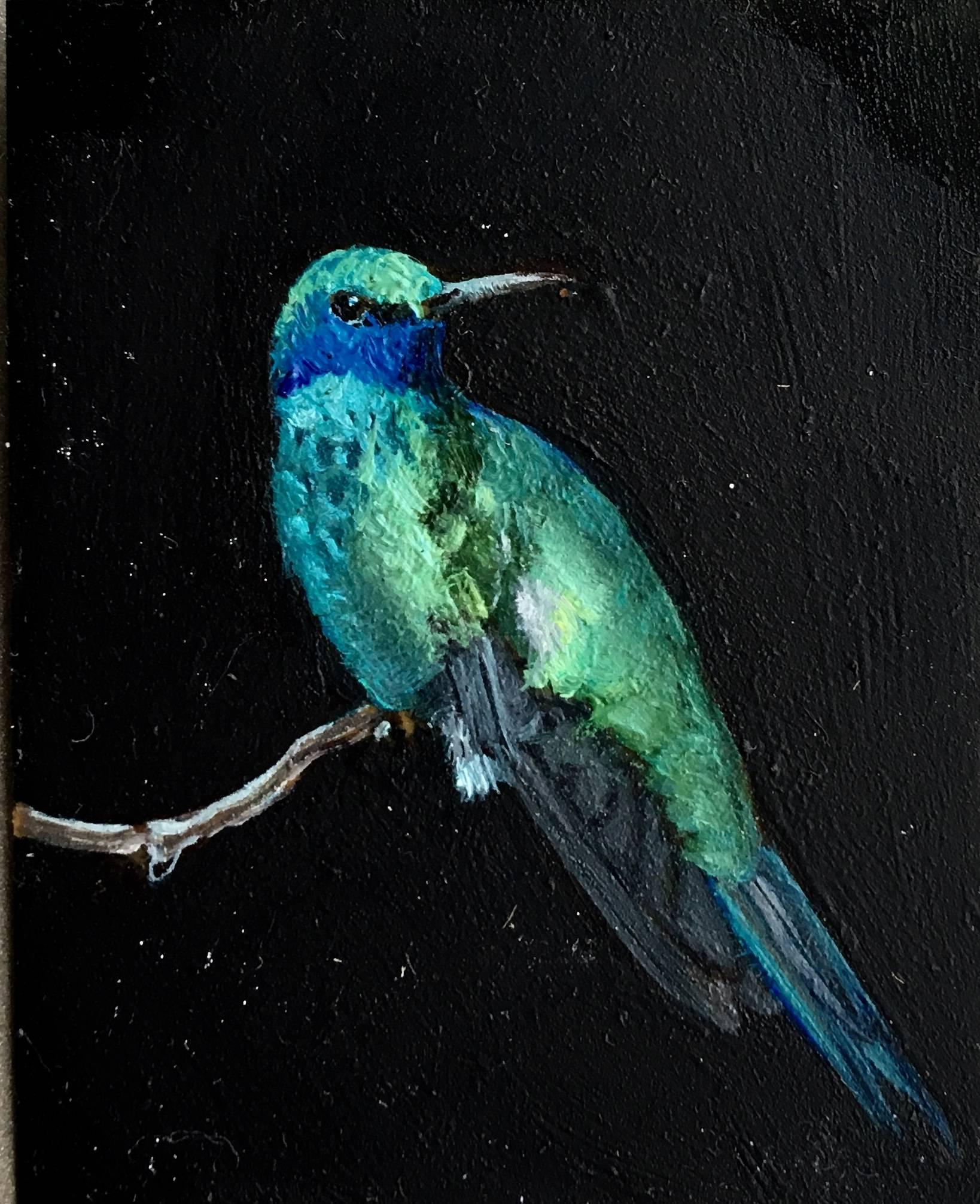 Dina Brodsky's realist oil on mylar animal miniature, "Blue Hummingbird," 2018, depicts a tiny blue hummingbird perched on a small branch. The bird's brilliantly saturated turquoise, royal blue, and emerald feathers are highlighted by the its black