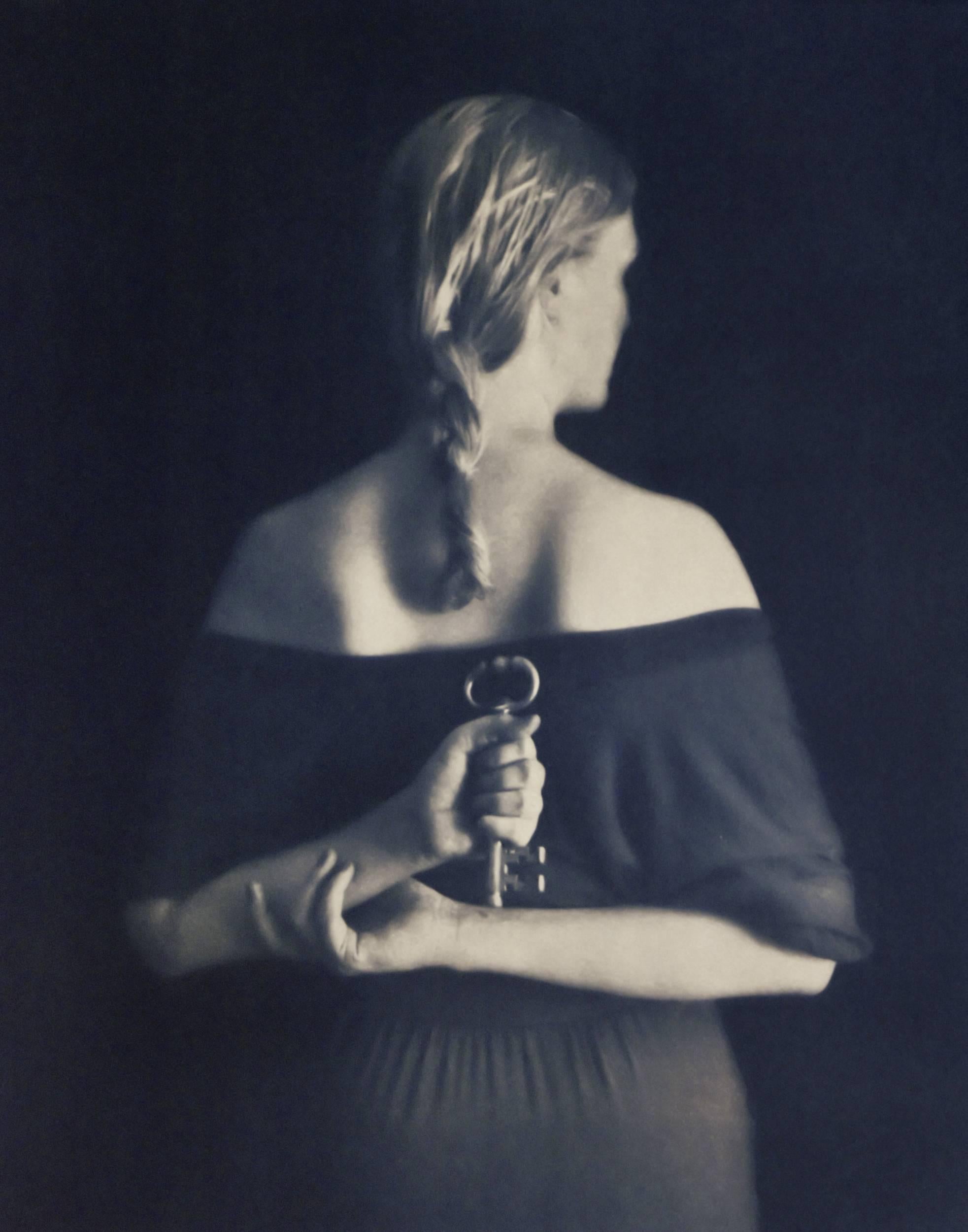 Emma Powell Figurative Photograph - The Key