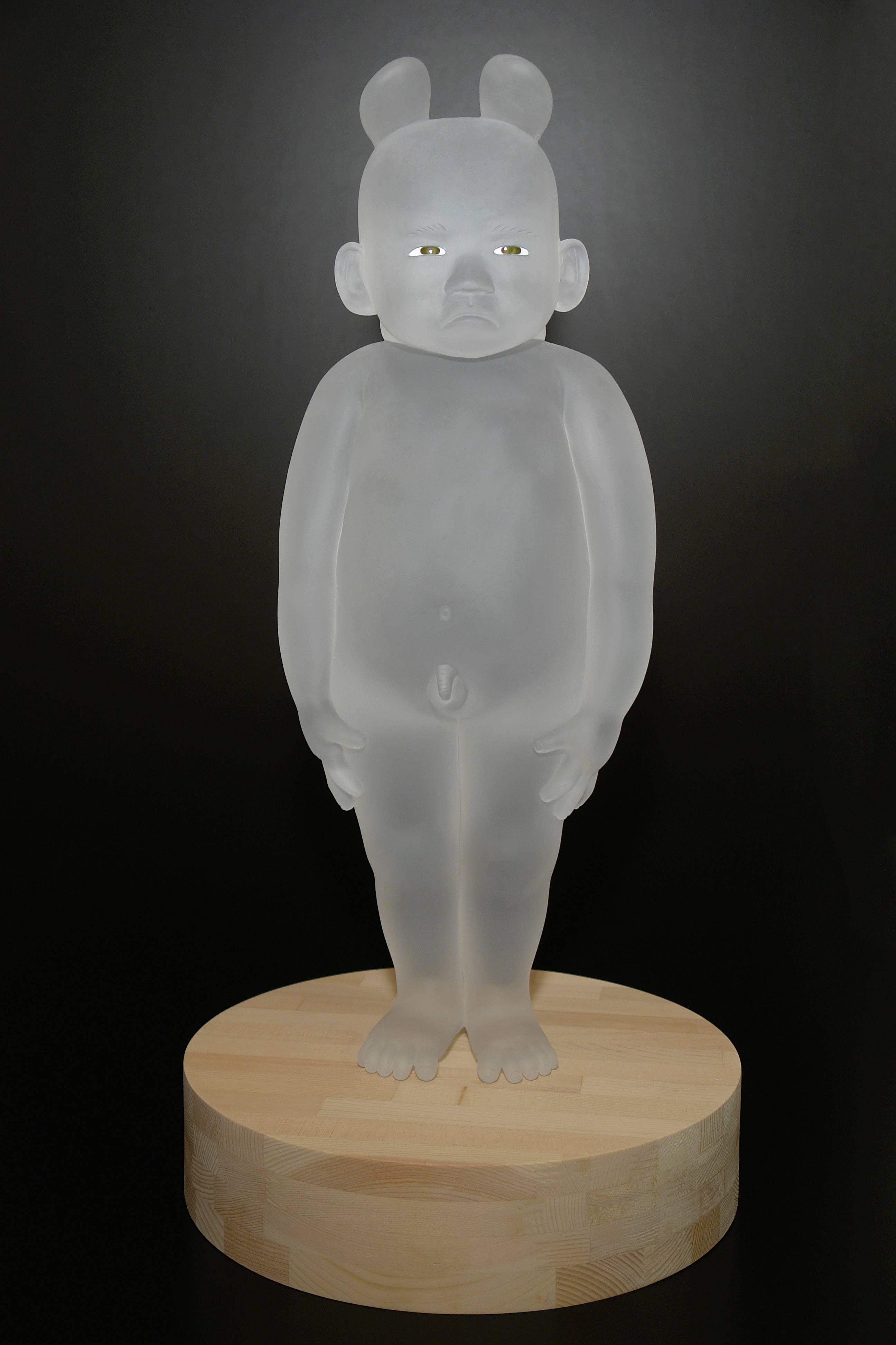 Koichi uses the lost-wax kiln casting glass technique. First, he makes the original form of the babies in wax, pours it in refractory plaster to create a mold and fills the mold with glass in the electric kiln. Koichi melts it at a high temperature
