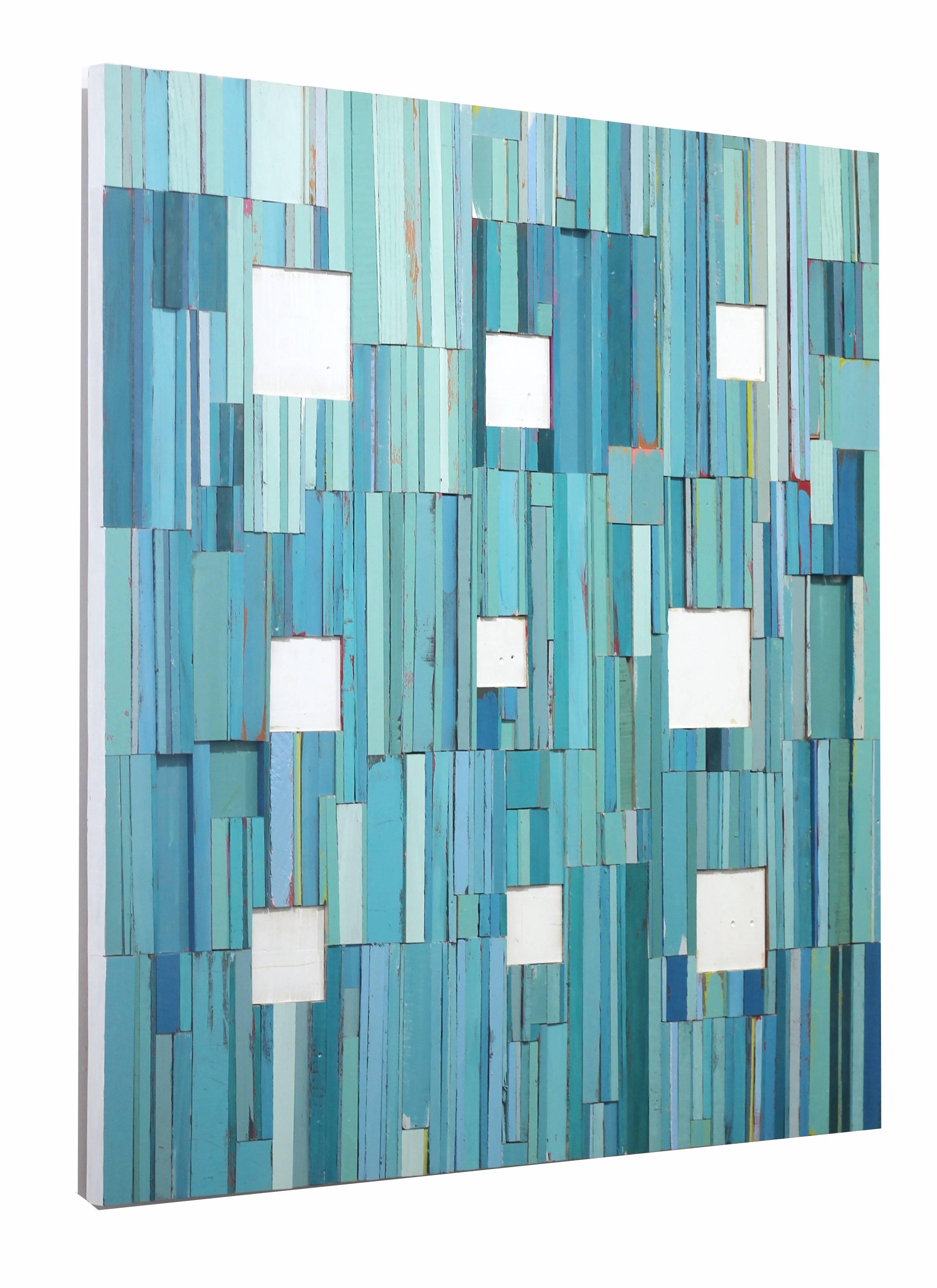 This 48 inch square original mixed media artwork by Rebecca Klundt is a assemblage of found wood, finished with layers of acrylic paint, resulting in a geometric abstraction artwork. It is mounted on a wood panel, wired and ready to hang. The sides