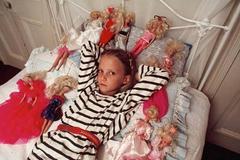Alicia Rountree with her Barbie dolls, Mauritius