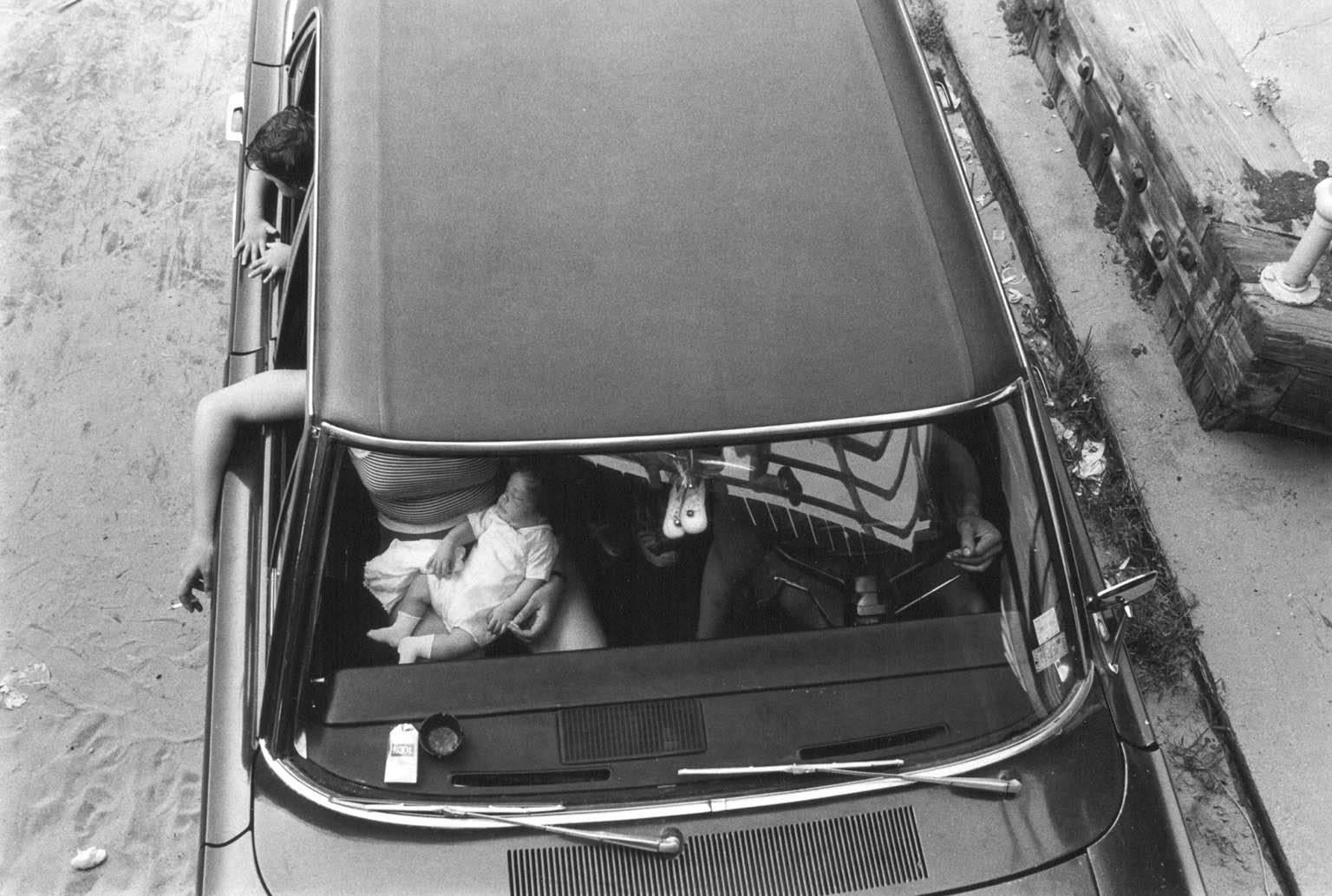 Arlene Gottfried Black and White Photograph - Baby in Car Coney Island  NY