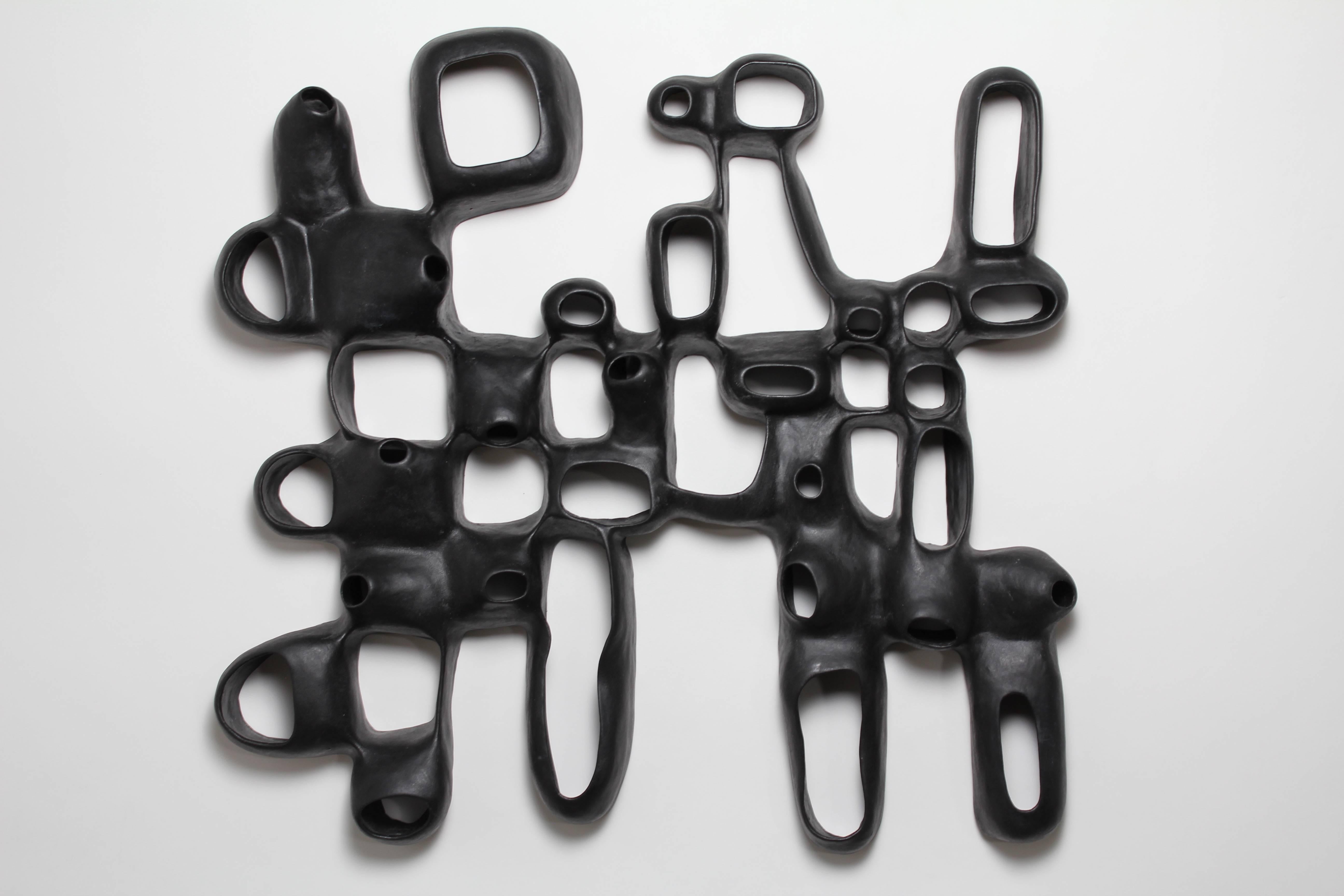 Joan Lurie Abstract Sculpture - Untitled Wall #2 - black porcelain geometric wall hanging sculpture