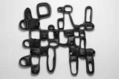 Untitled Wall #2 - black porcelain geometric wall hanging sculpture