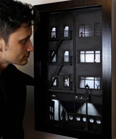 Lavanderia a gettoni.  scultura videowall ispirata ai film noir dello studio McGuire