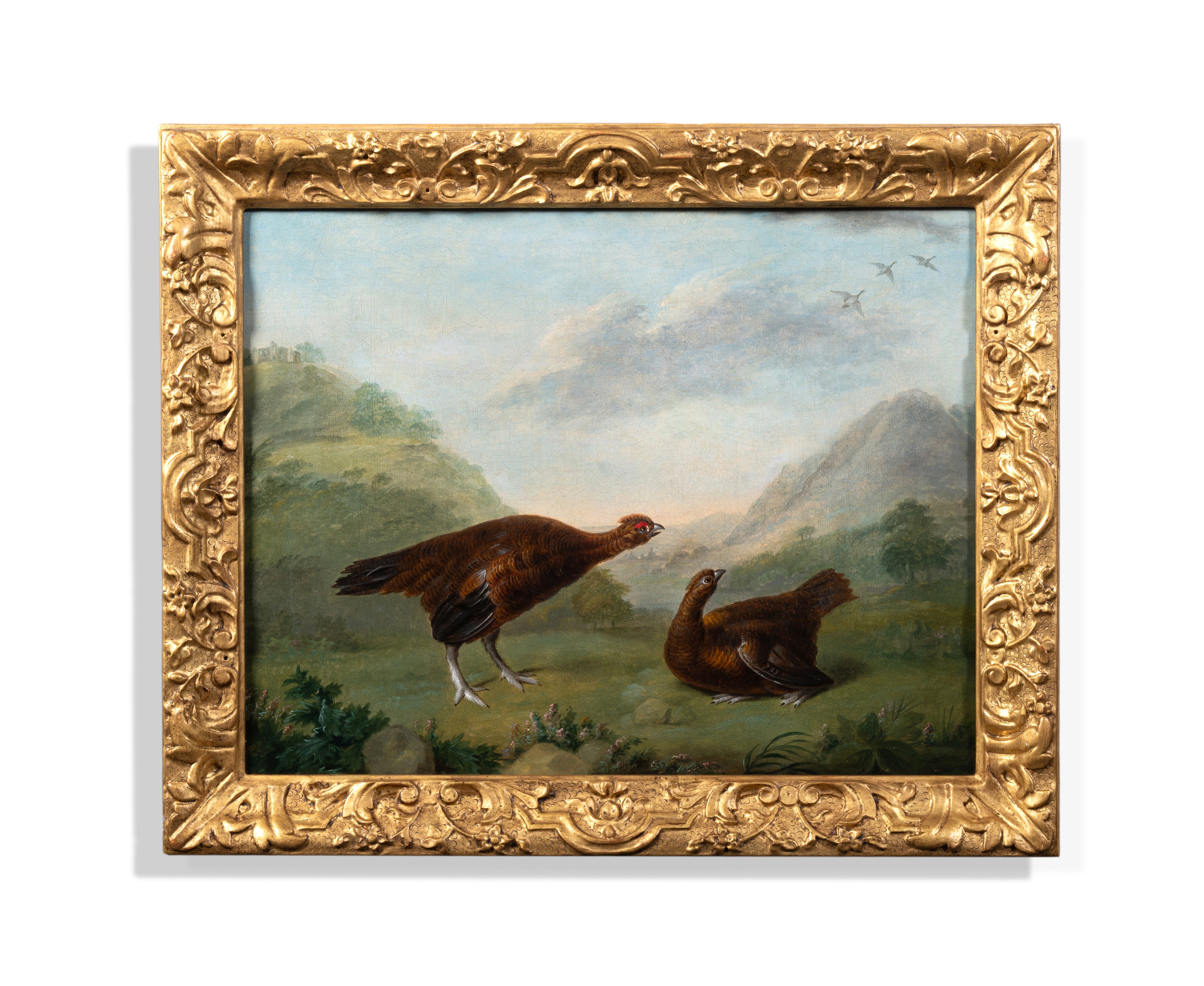 Two partridges in a mountainous landscape