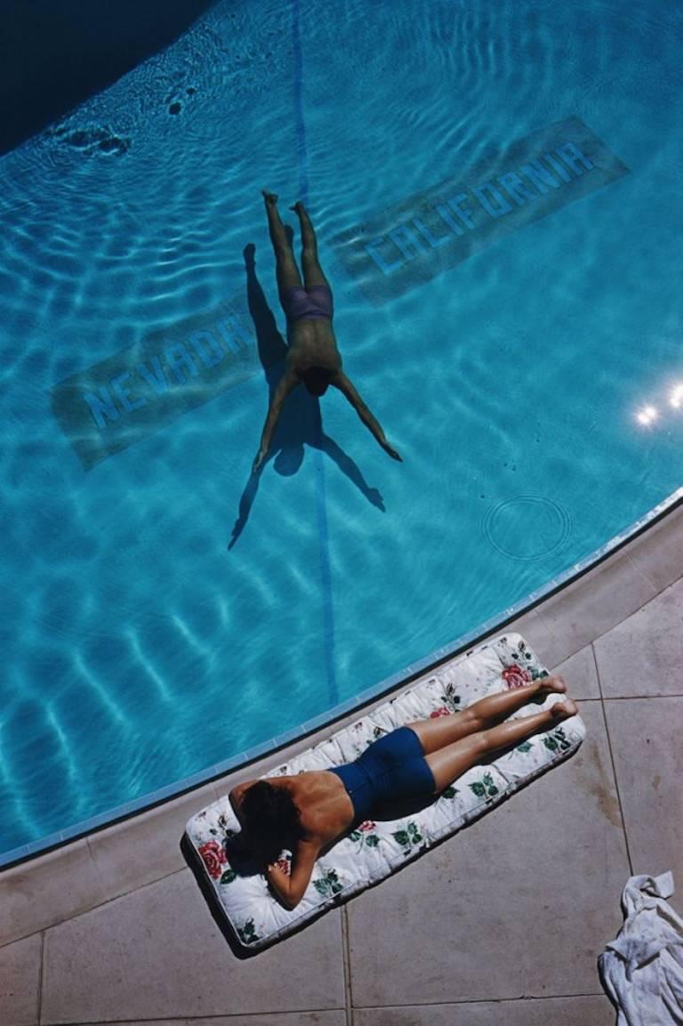 'Swimmer And Sunbather' (Chromaluxe Aluminium Print) - Photograph by Slim Aarons