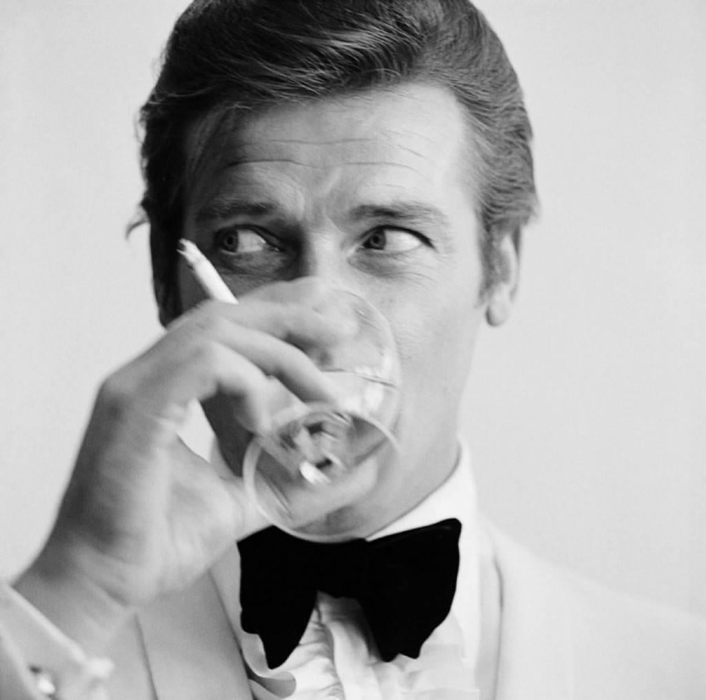 Peter Ruck Black and White Photograph - 'Shaken Not Stirred' Roger Moore