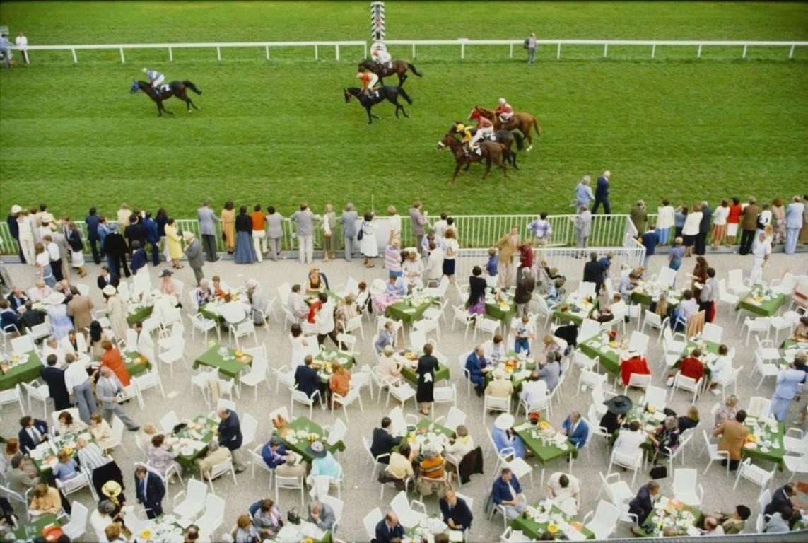 'Racing At Baden Baden'

Spectators dine in the open air as the horses go by at Baden Baden racecourse, Germany, September 1978.

In his words, he photographed 'beautiful people in beautiful places, doing beautiful things'.

An exquisite Open