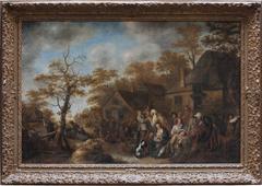 A gipsy fortune-teller, with numerous other figures outside a village inn