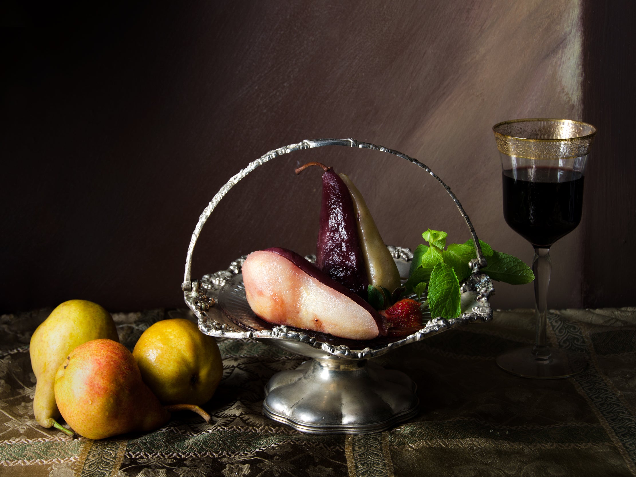 Dora Franco Still-Life Photograph - Peras en almíbar de vino rojo. From The Bodegones  still life series