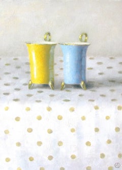 "Elegant Still Life of Yellow and Blue Cups on Polka Dots"