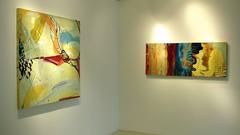 "Lit"     Abstraction of blues, tan, black, deep red and cream in 2 panels