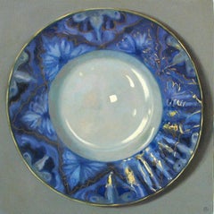 "Elegant Still Life of Blue Plate with Gold"