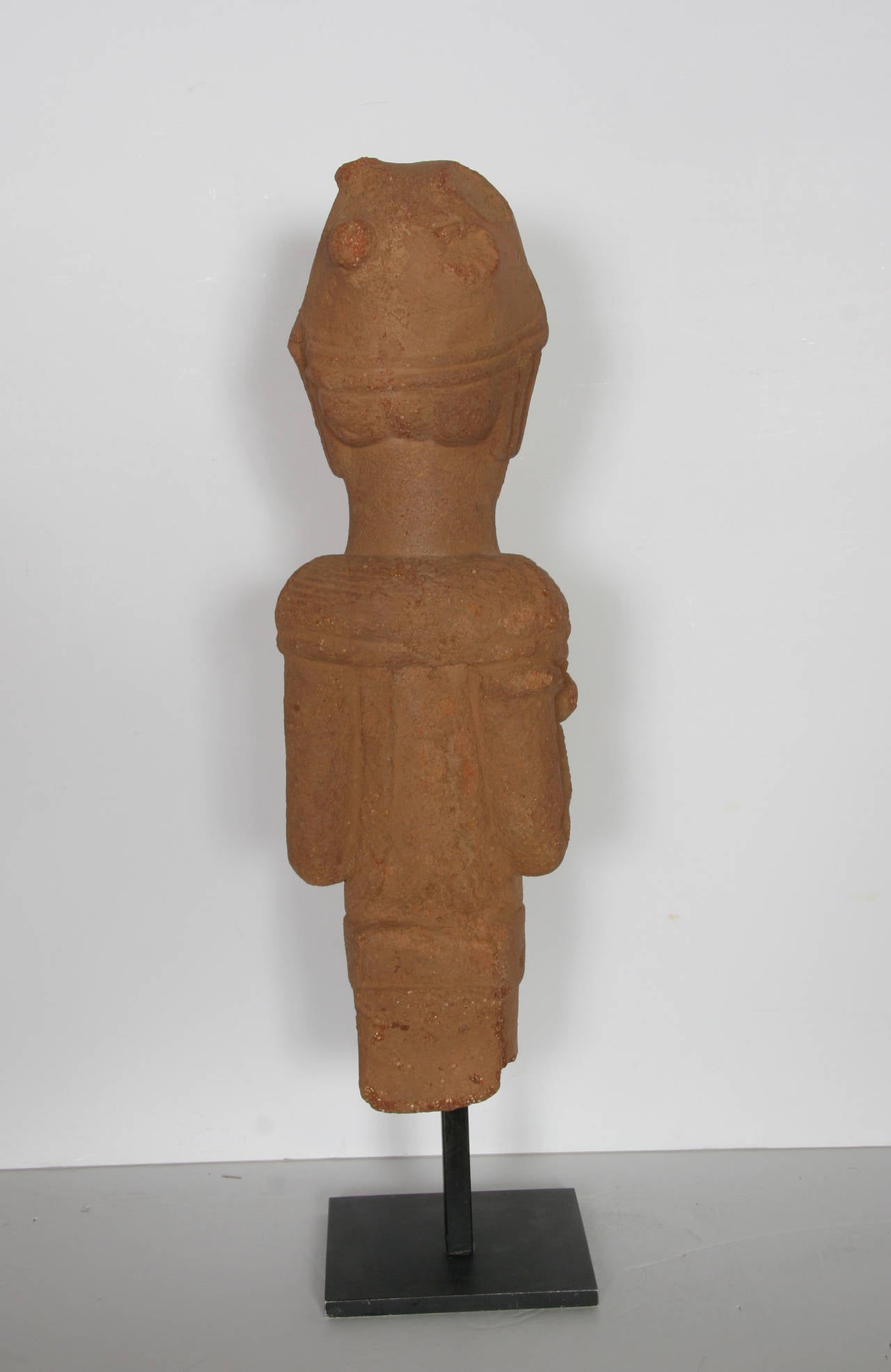 This terracotta sculpture dates back to 500BC-200AD.  The Nok culture appeared in Northern Nigeria around 1000 BC and vanished under unknown circumstances around 300 AD in the region of West Africa.  Total height with Stand 26 inches.