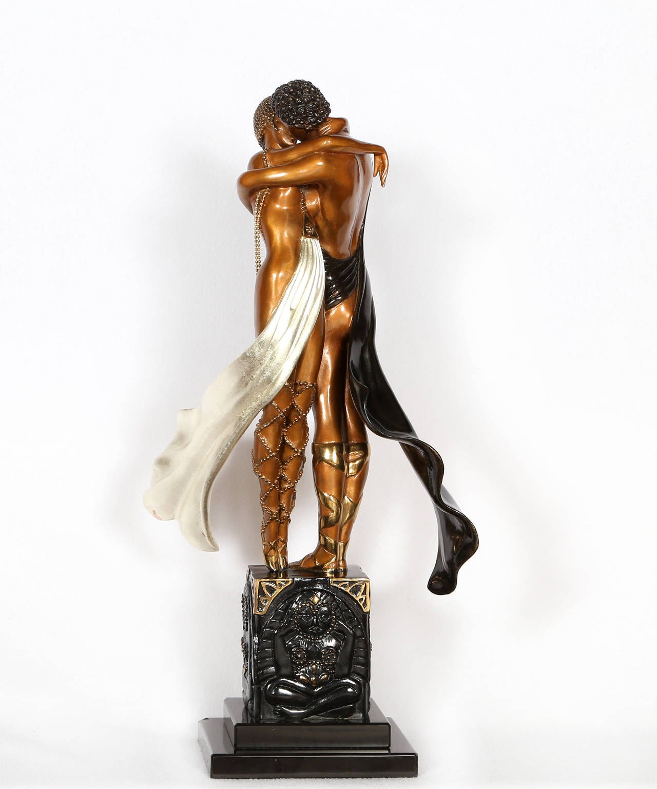Artist: Erte
Title: Lovers and Idol
Year: 1988
Medium: Bronze Sculpture with patina, signature inscribed
Edition: 329/375
Size: 20  x 8  x 6 in. (50.8  x 20.32  x 15.24 cm)
