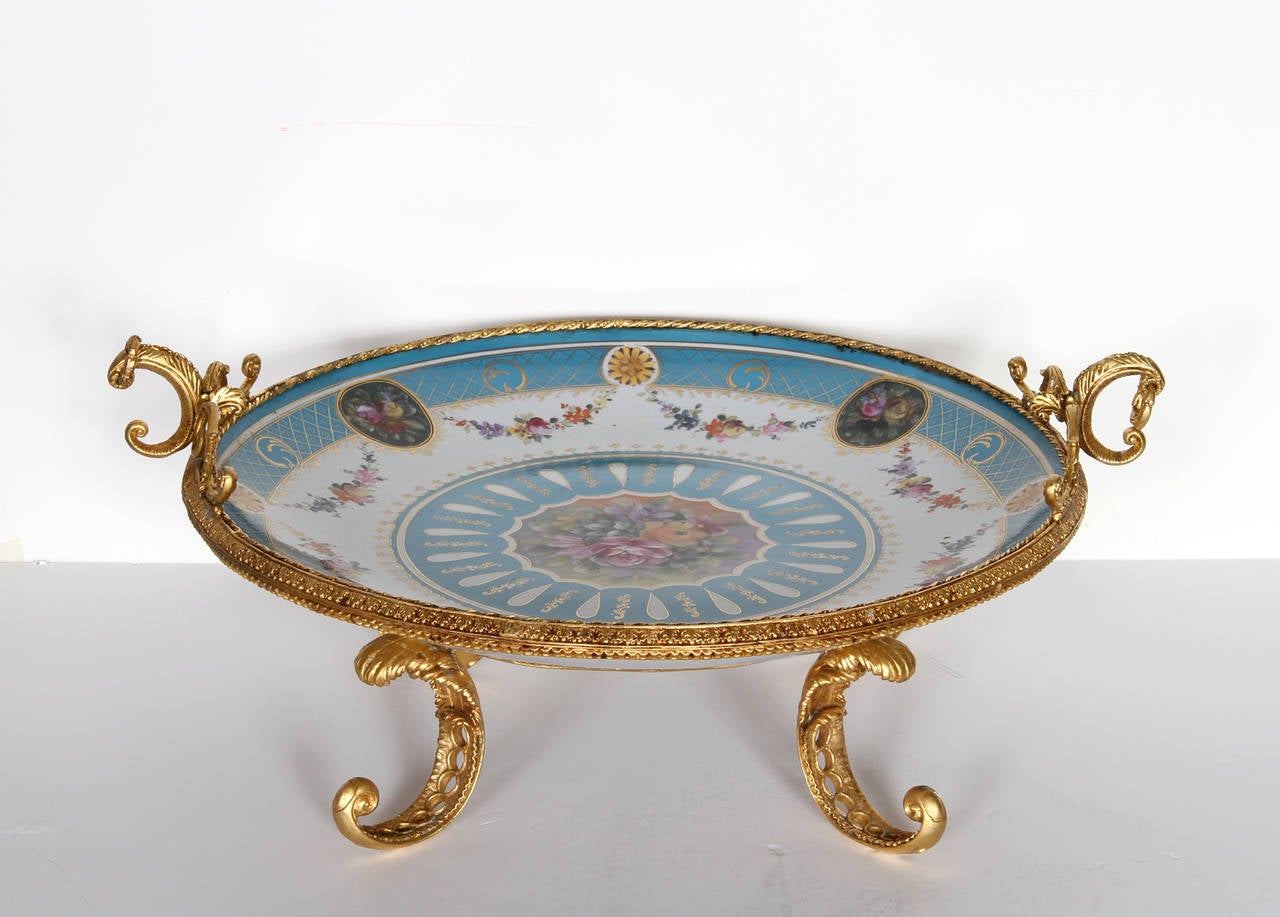 Maker: Meissen, German
Item: Service Plate (Blue)
Description: Porcelain with Gilt Stand and Trim
Size: 8.75 in. x 18.5 in. x 18.5 in. (22.23 cm x 46.99 cm x 46.99 cm)