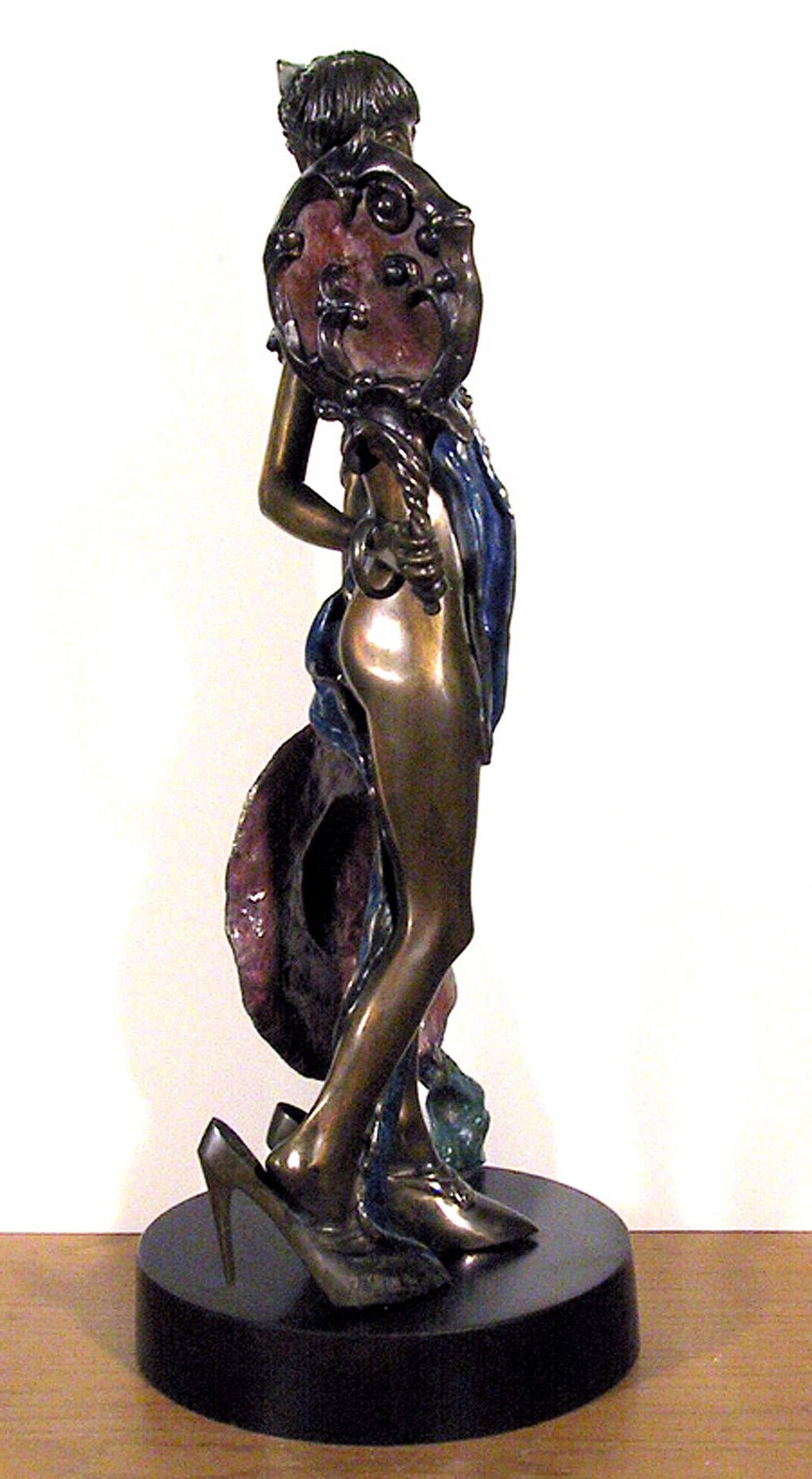 Artist: Richard Shiloh, Polish/Israeli (1949 - )
Title: Girl holding a Mirror
Year: Circa 1975
Medium: Bronze with Painted patina, signature inscribed
Edition: 2/24
Paper Size: 19 inches tall 
Itamar Foundry