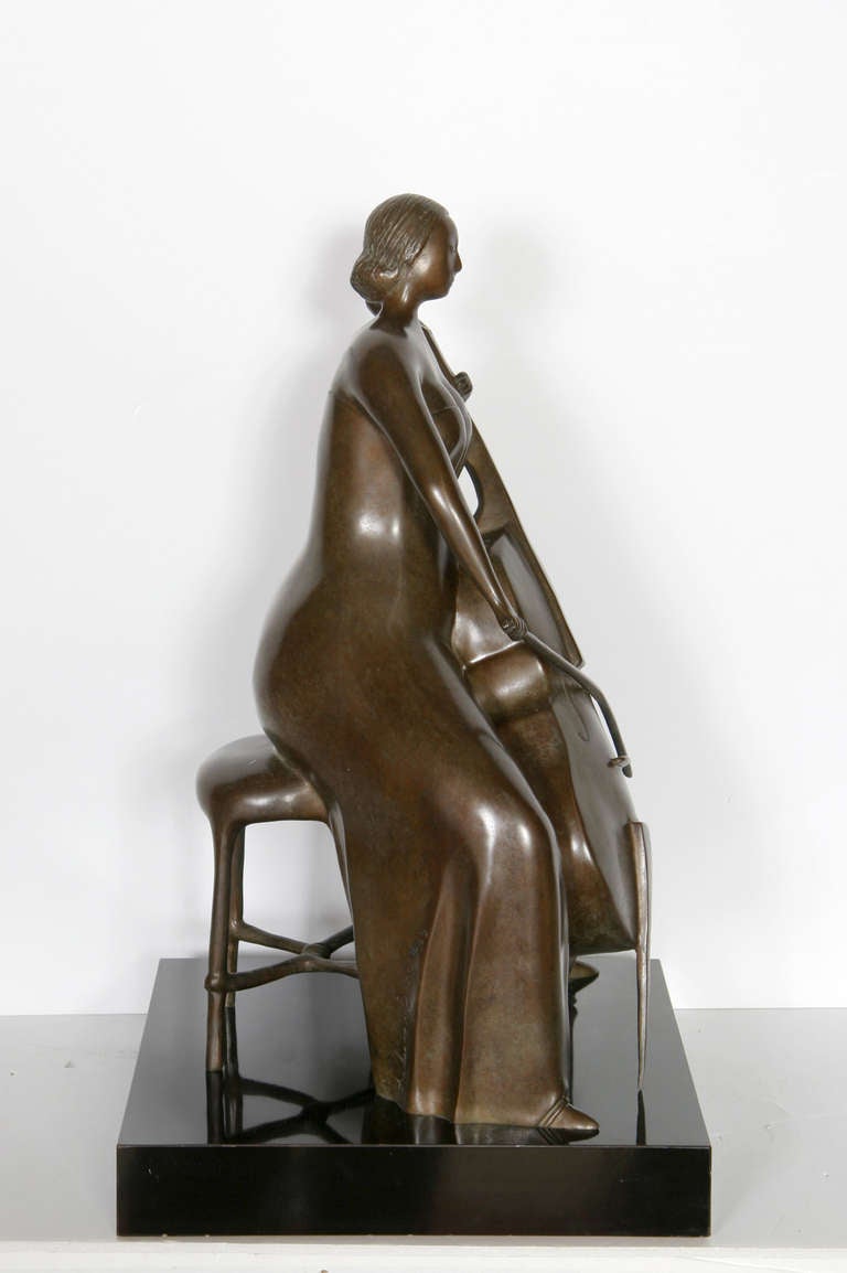A lovely bronze sculpture of a woman playing the cello by the modern folk artist Branko Bahunek. The sculpture is number 10 an edition of 15 produced in 1989.