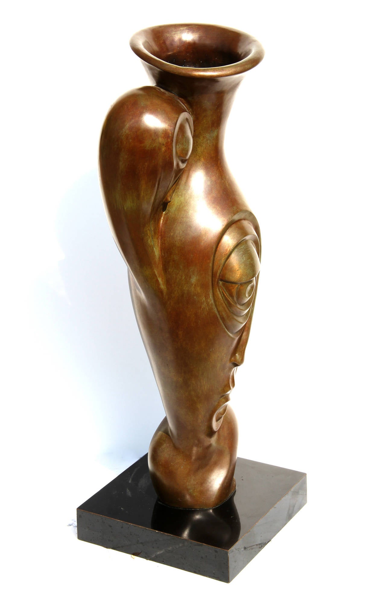 Artist: Unknown, possibly Russian
Title: Profile Pitcher
Medium: Bronze Sculpture with Patina
Size: 26.5 in. x 9 in. x 5 in. (67.31 cm x 22.86 cm x 12.7 cm) Base: 2.5 x 10.5 x 10.5 inches