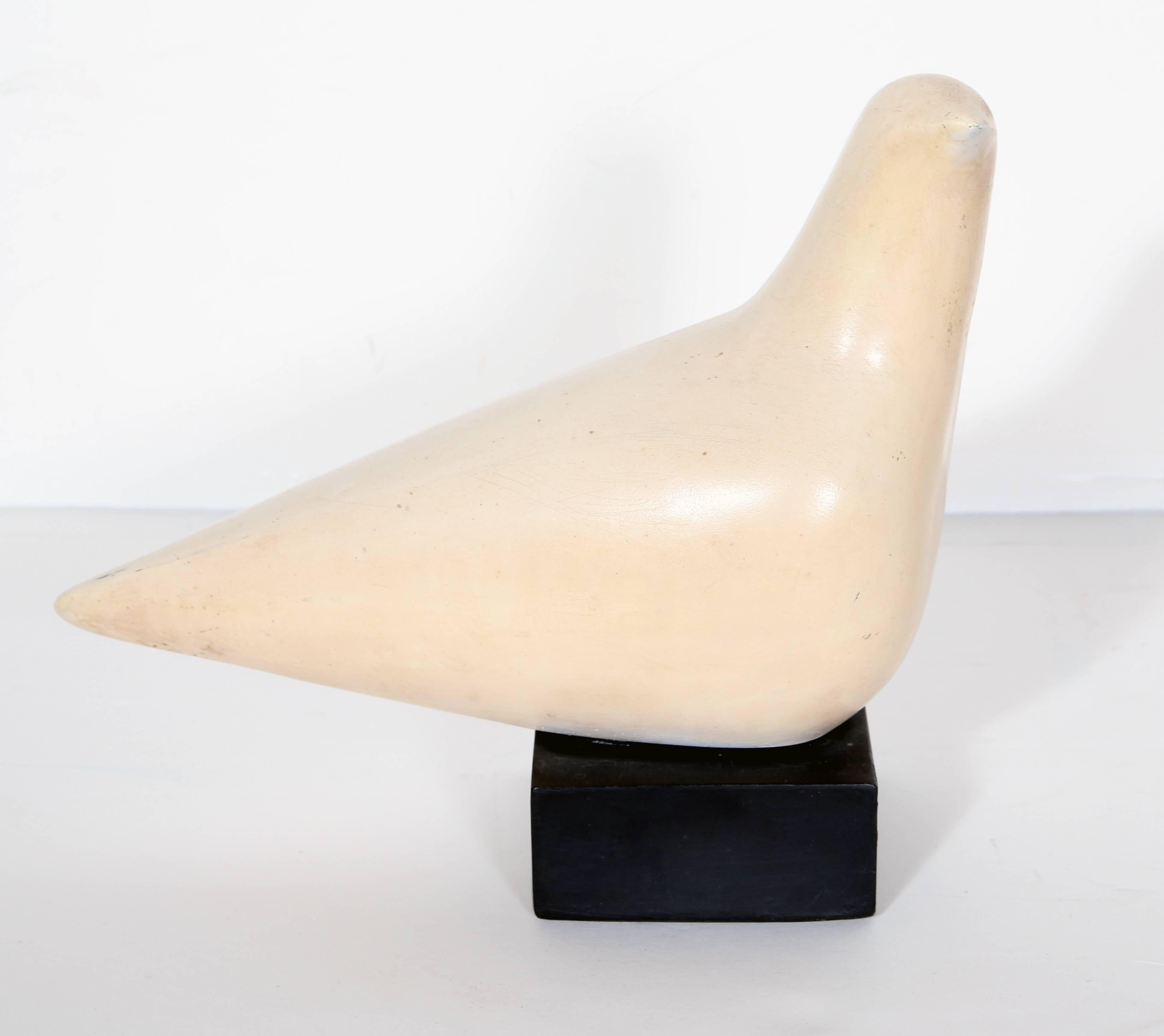 This Art Deco dove is a resin sculpture by American artist Cleo Hartwig, created circa 1960. Hartwig's curiosity and interest in natural forms, she says, come from her childhood memories outside: There is such rich and endless variety in nature that