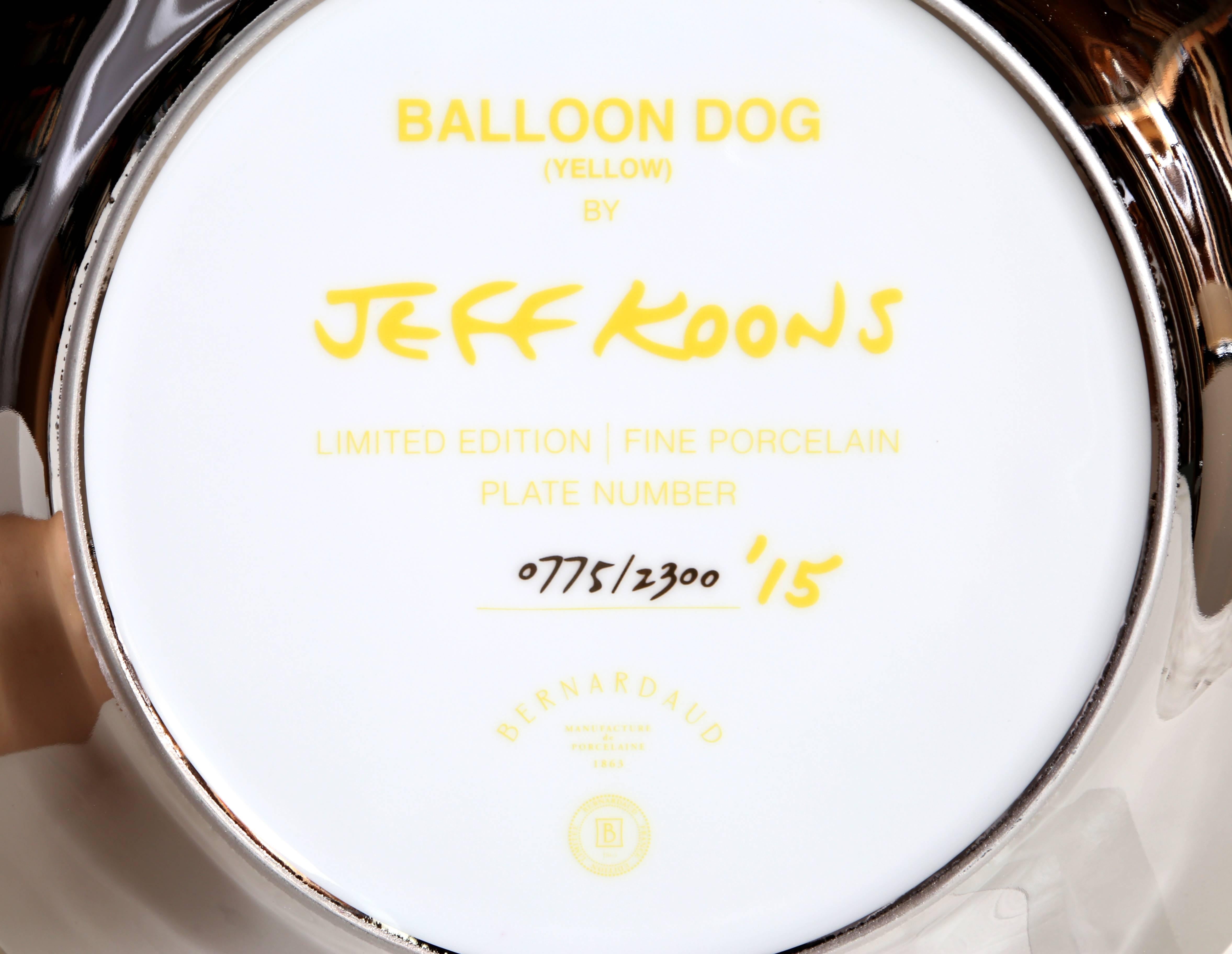 Artist: Jeff Koons, American (1954 - )
Title: Balloon Dog (Yellow)
Year: 2015
Medium: Porcelain with Mirror Finish, signed and numbered verso
Edition: 2300
Size: 10.5 x 10.5 x 5 in. (26.67 x 26.67 x 12.7 cm)
Includes all original packaging.