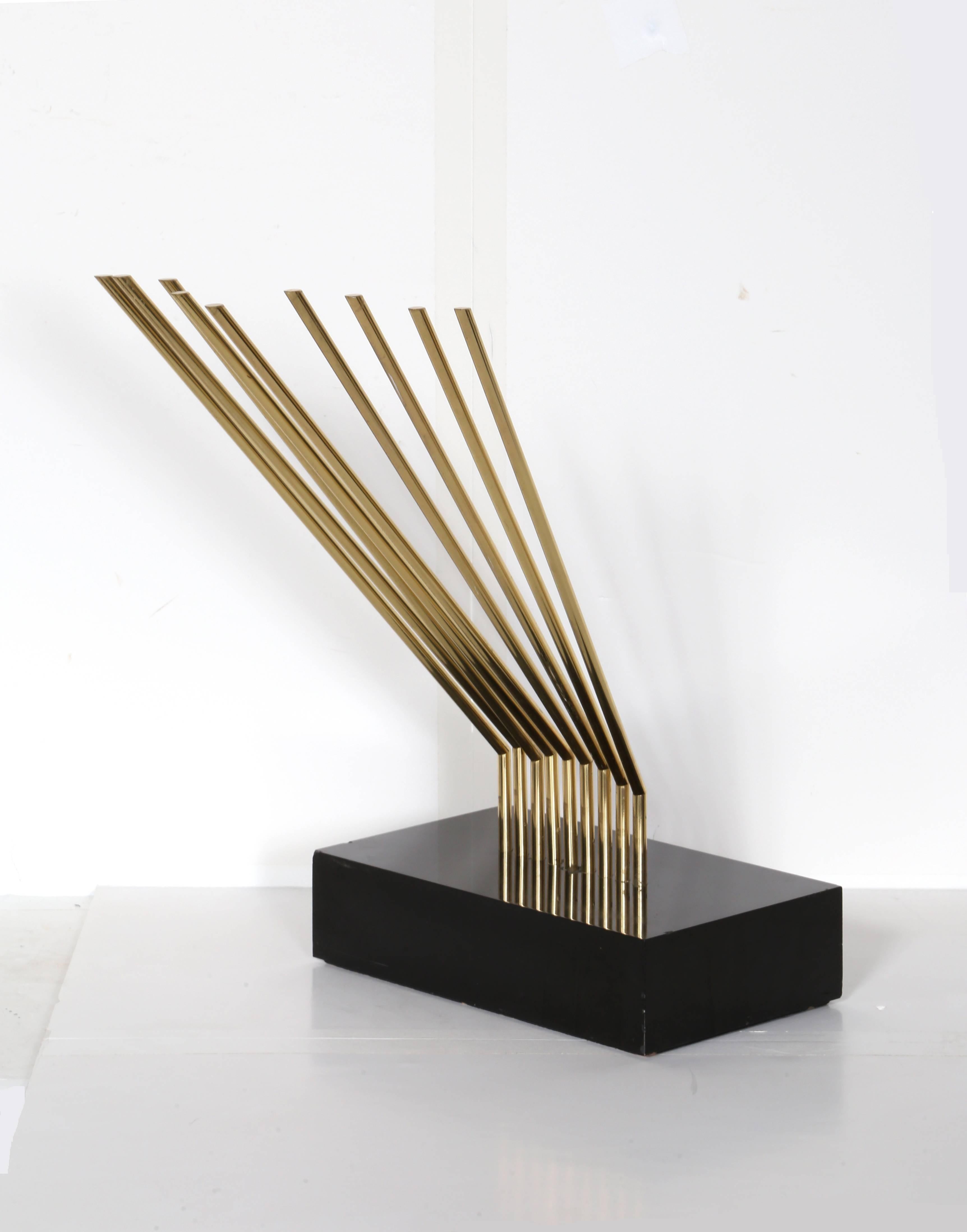 Artist: Yaacov Agam, Israeli (1928 - )
Title: In all Directions (Toutes Directions)
Year: circa 1970 
Medium: Brass Sculpture, signed, titled, and numbered in marker on base bottom
Edition: 6/9
Size: 17.25  x 11.5  x 7.25 in. (43.82  x 29.21  x