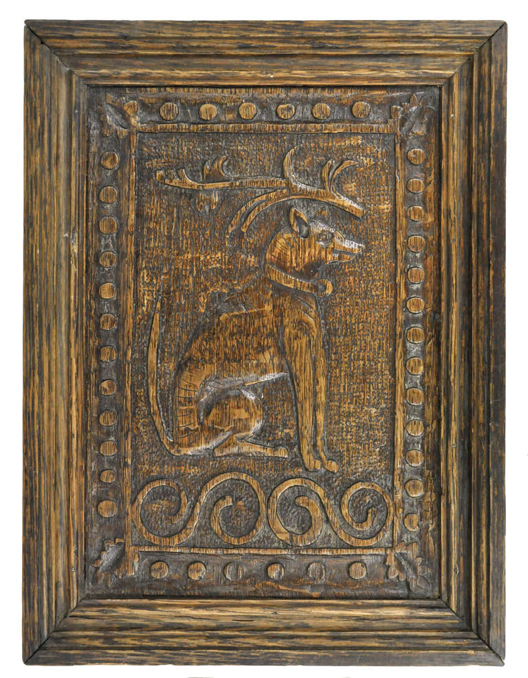 3 English oak panels (each 19.5 x 28 cm approx) depicting 2 hunting dogs and a dog handler, later wooden frames.  
late 17th century.