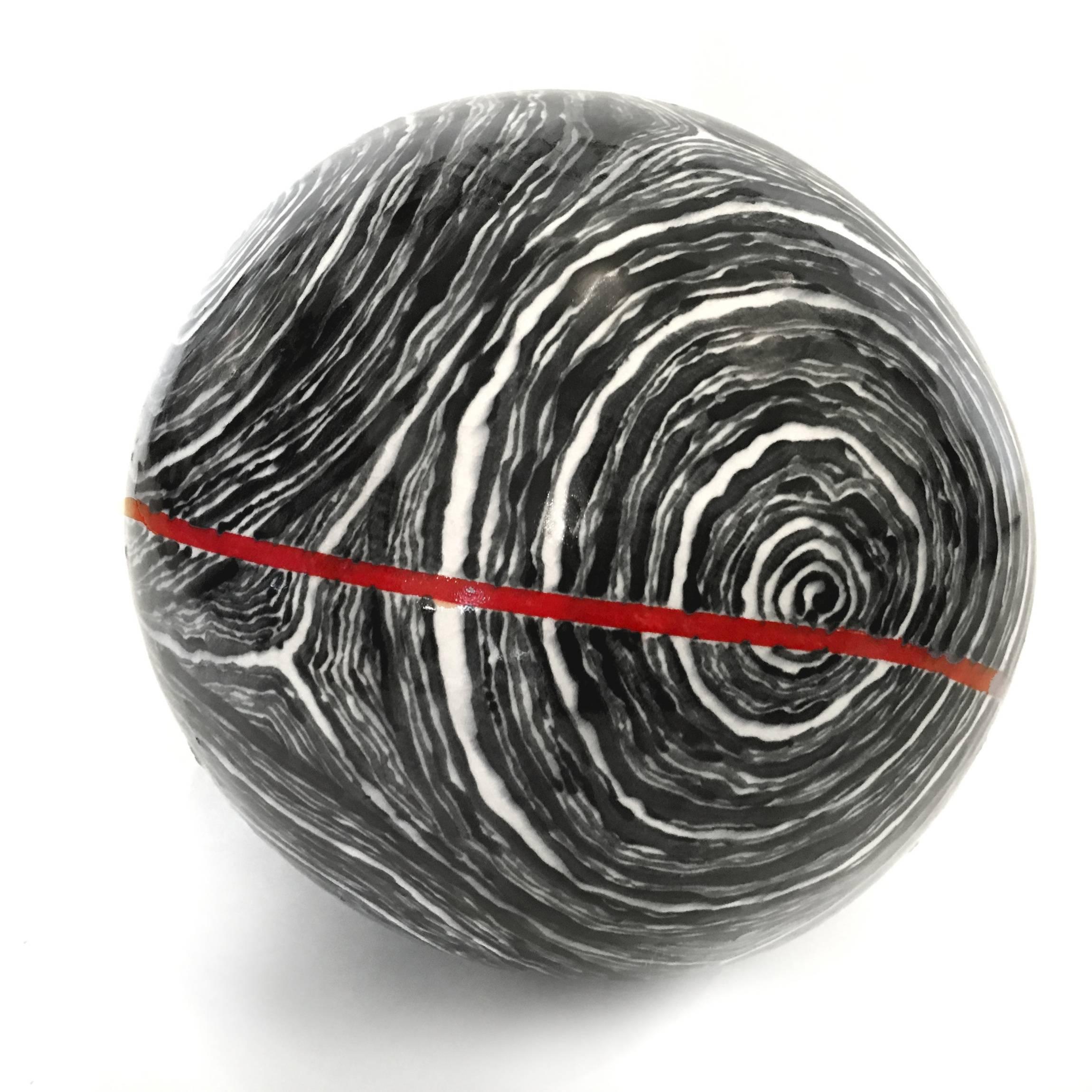 B & White Loose Stripe Ball with Red Meridian - Sculpture by David Kuraoka