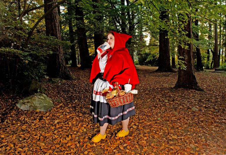 Not-So-Little Red Riding Hood (from the Fallen Princesses series) - Photograph by Dina Goldstein