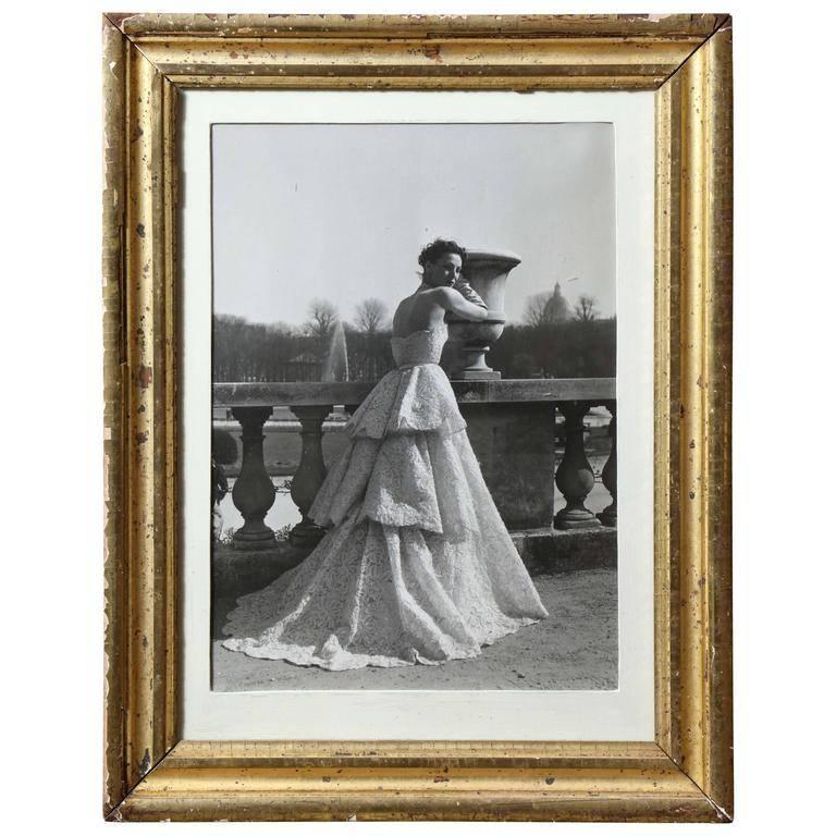 Willy Maywald Black and White Photograph - Lucky wearing a Dior evening gown