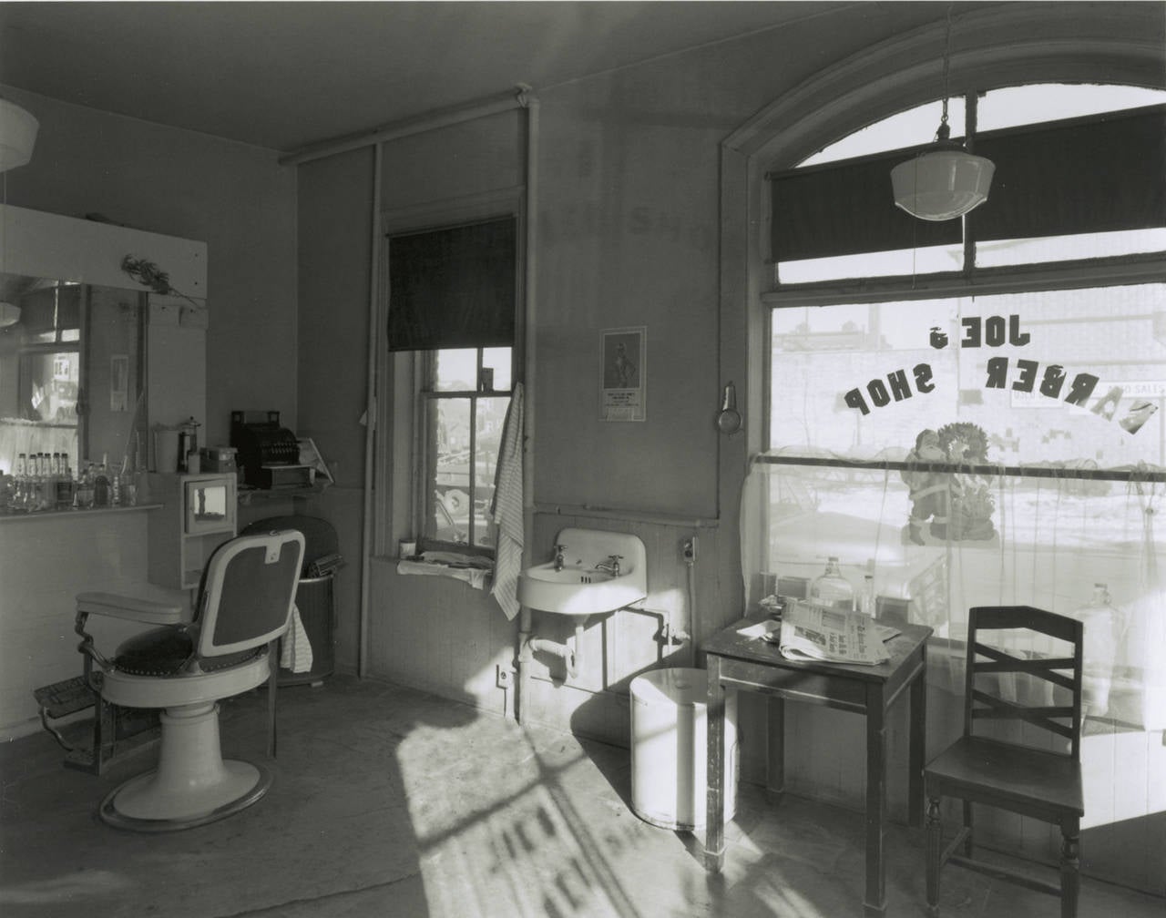 George Tice Black and White Photograph - Joe's Barber Shop, Paterson, New Jersey