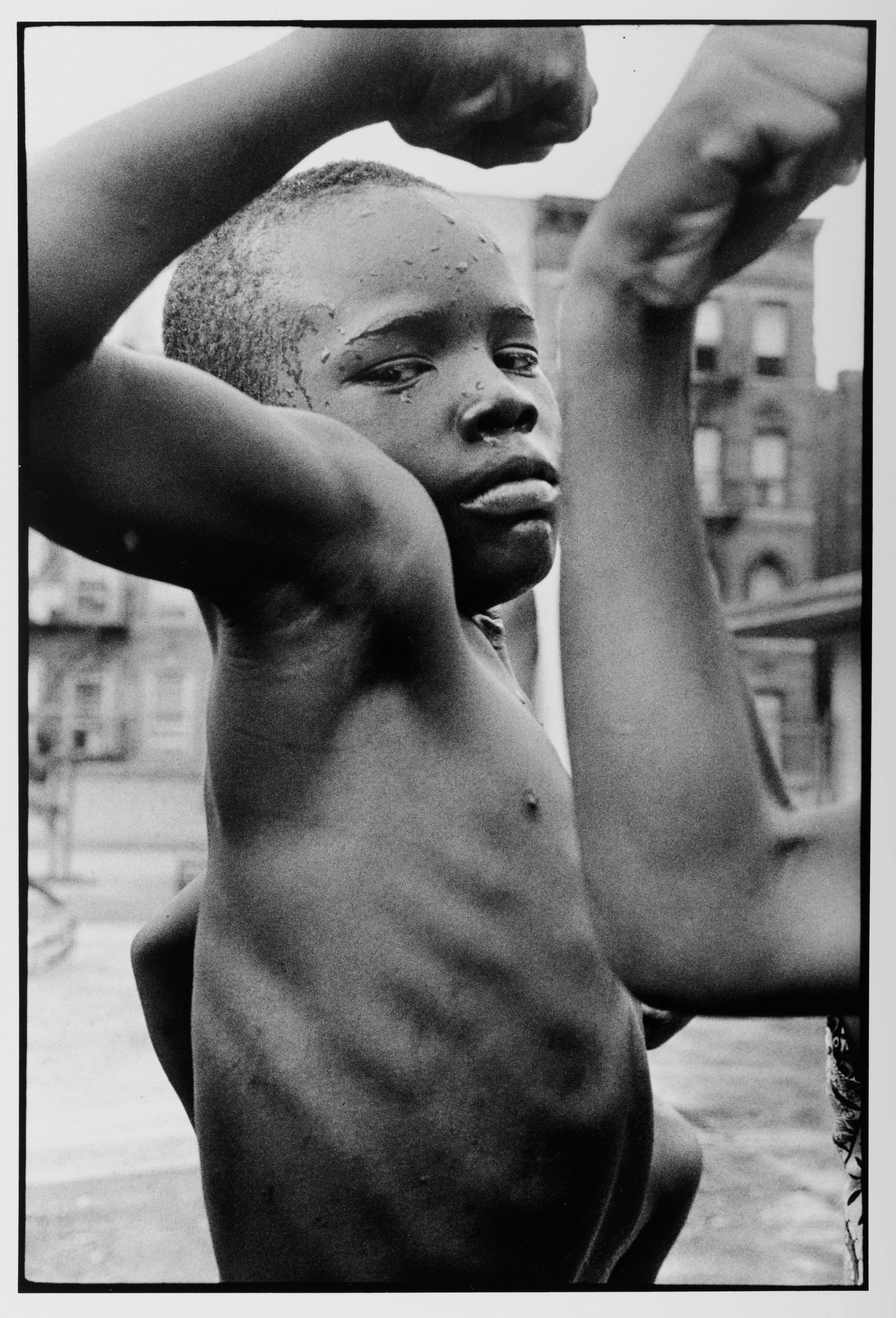 Leonard Freed Black and White Photograph - Harlem NYC Muscle Boy