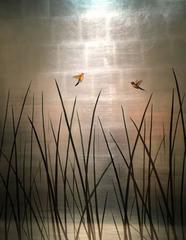 Hummingbirds over Reeds