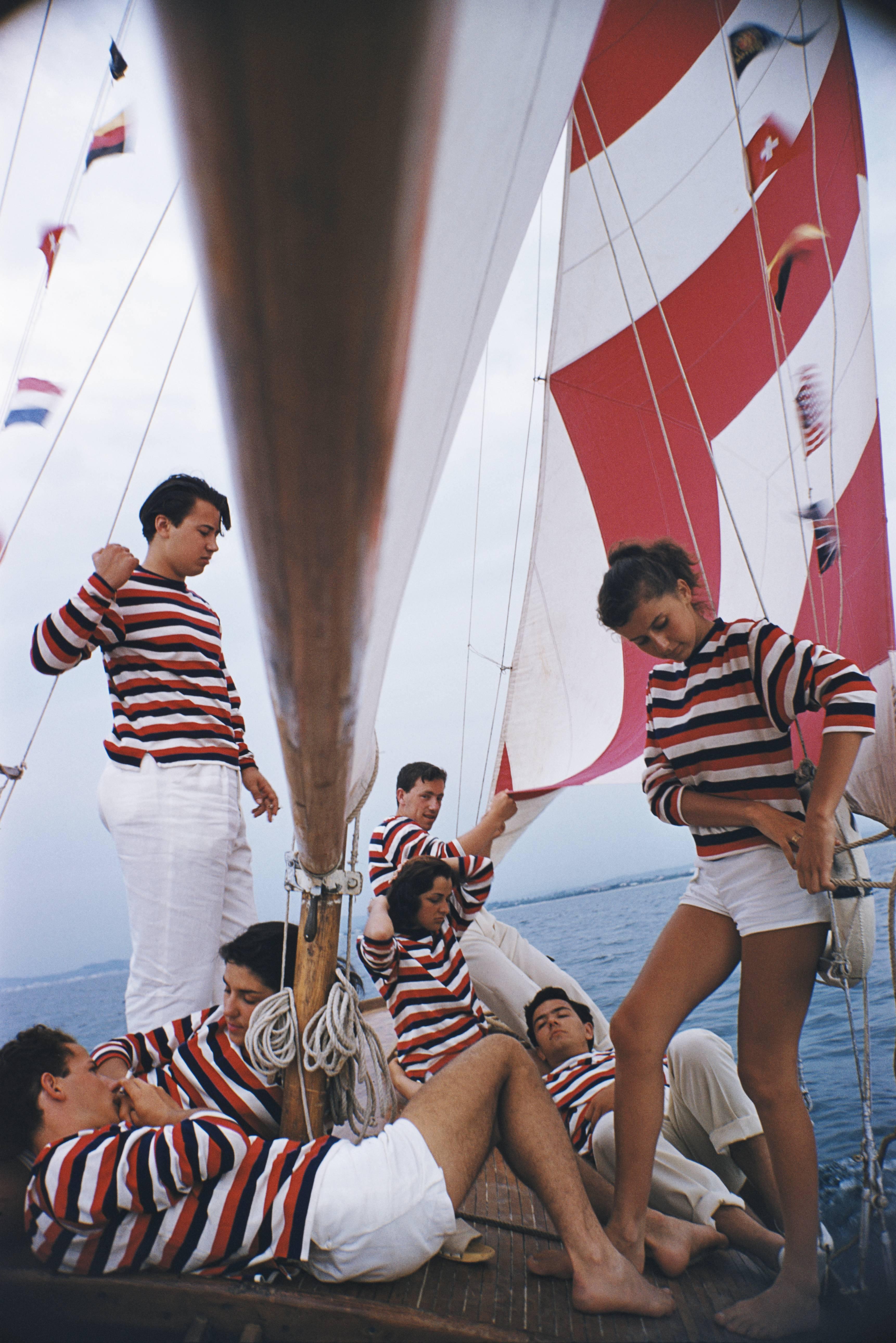  Young holidaymakers from Milan enjoy a sail on the Adriatic, 1956. (Photo by Slim Aarons/Hulton Archive/Getty Images) Estate Stamped Limited Edition of 150

C-type print from the original transparency held at the Getty Images Archive, London.